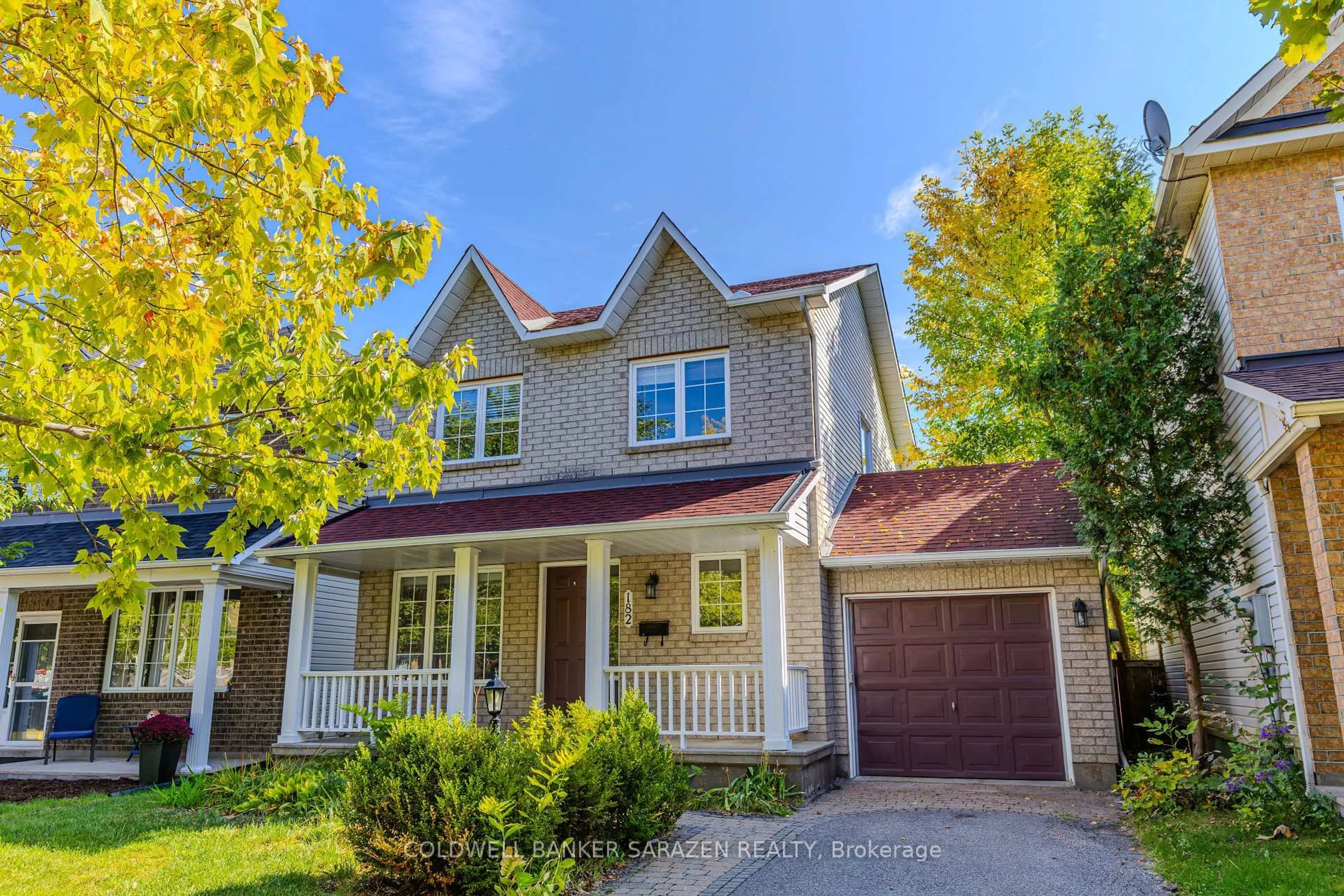 Home with vinyl exterior material, street for 182 Windhurst Dr, Ottawa Ontario K2G 6J4