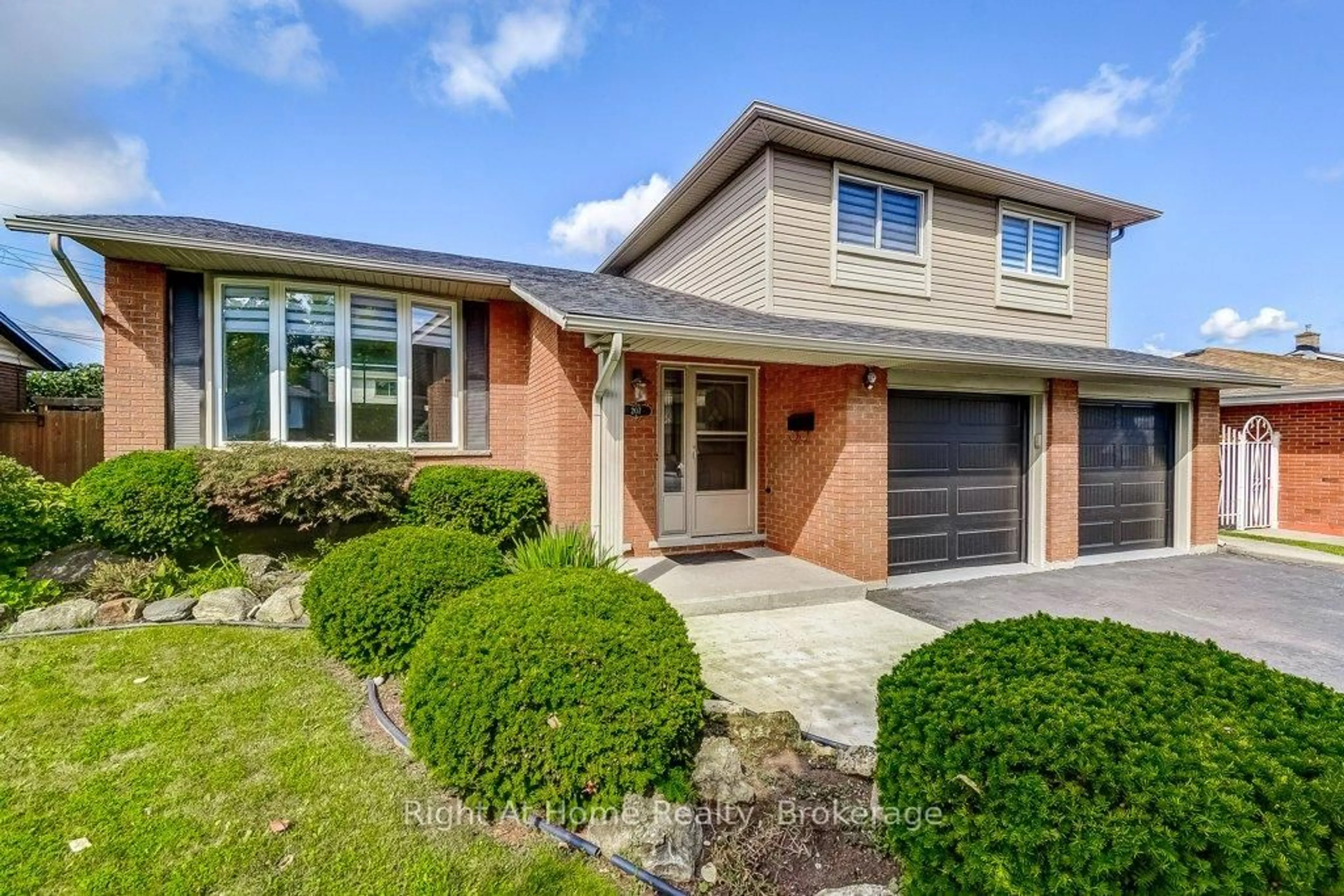 Home with brick exterior material, street for 207 Montmorency Dr, Hamilton Ontario L8K 5H3