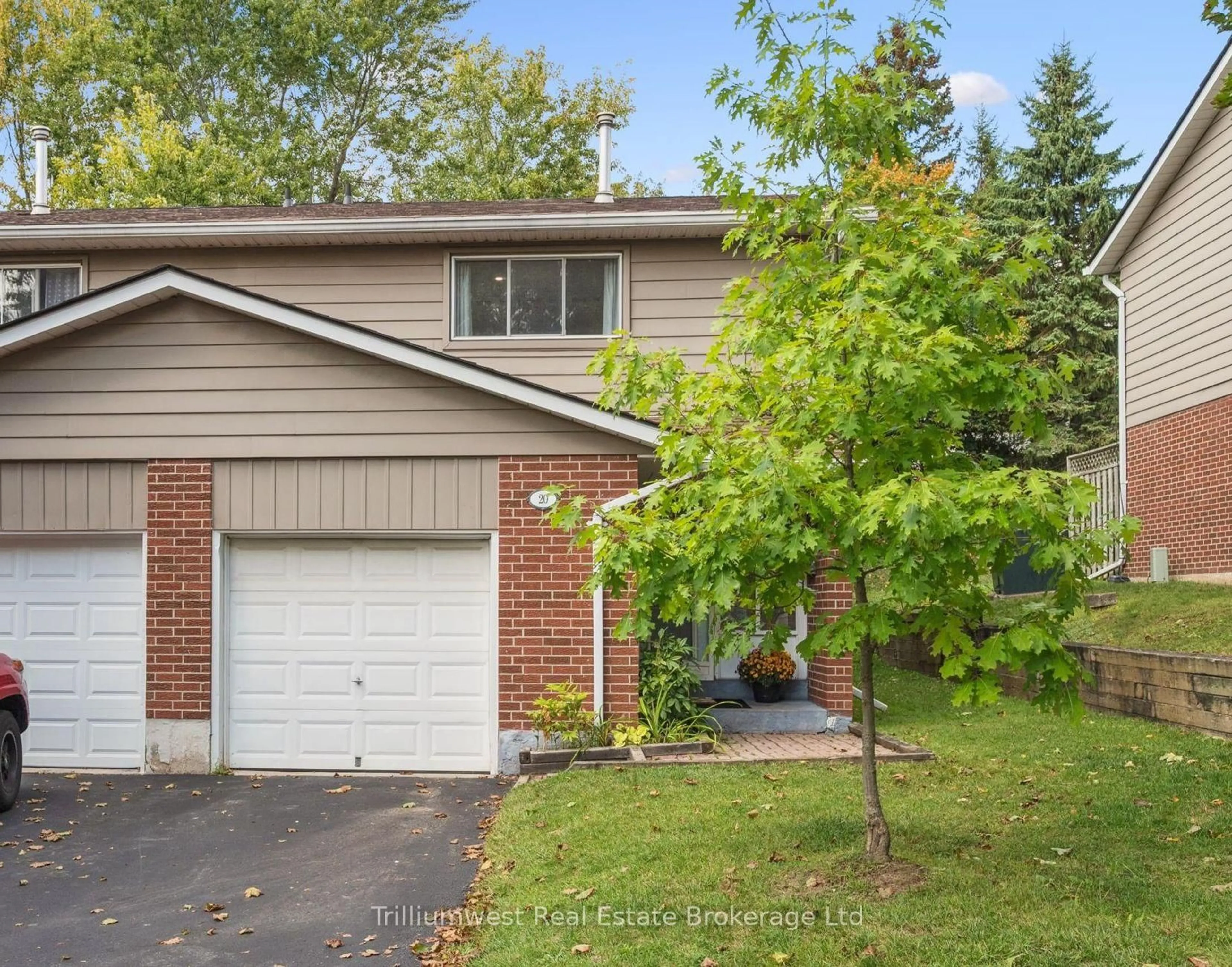 Home with brick exterior material, street for 16 Hadati Rd #20, Guelph Ontario N1E 6M2