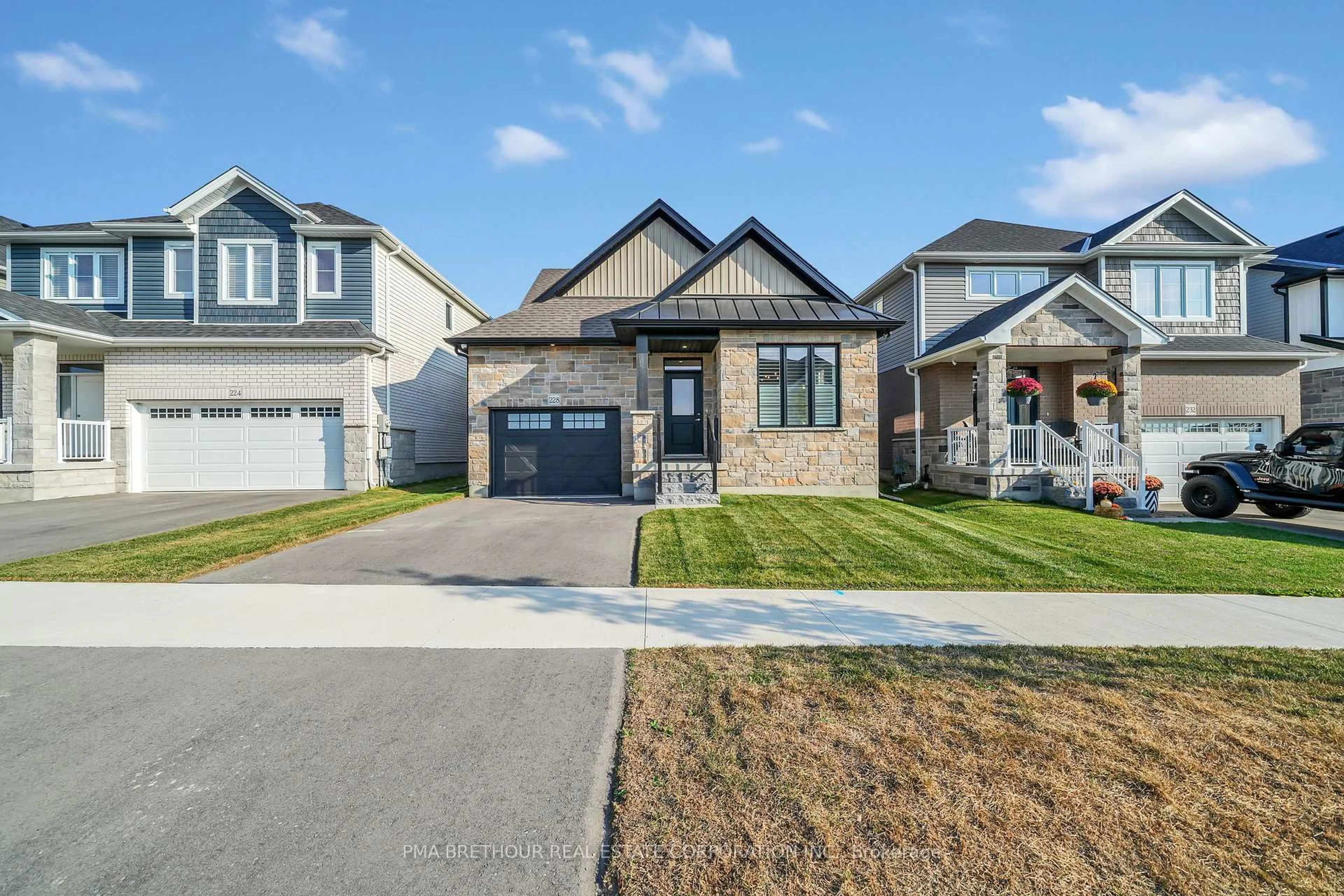 Home with brick exterior material, street for 228 Haylock Ave, Centre Wellington Ontario N0B 1S0