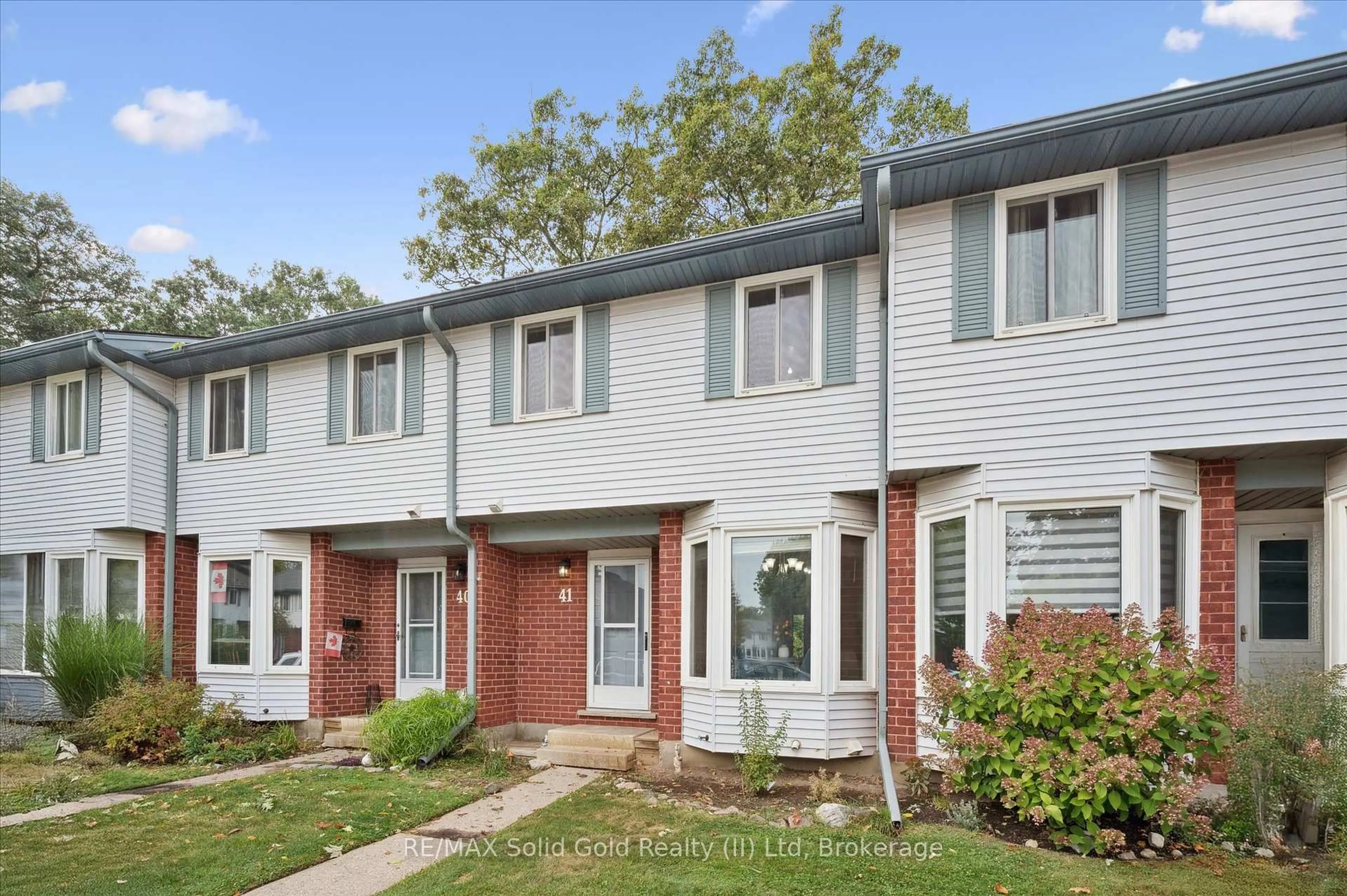 Home with brick exterior material, street for 219 Kingswood Dr #41, Kitchener Ontario N2E 3J5