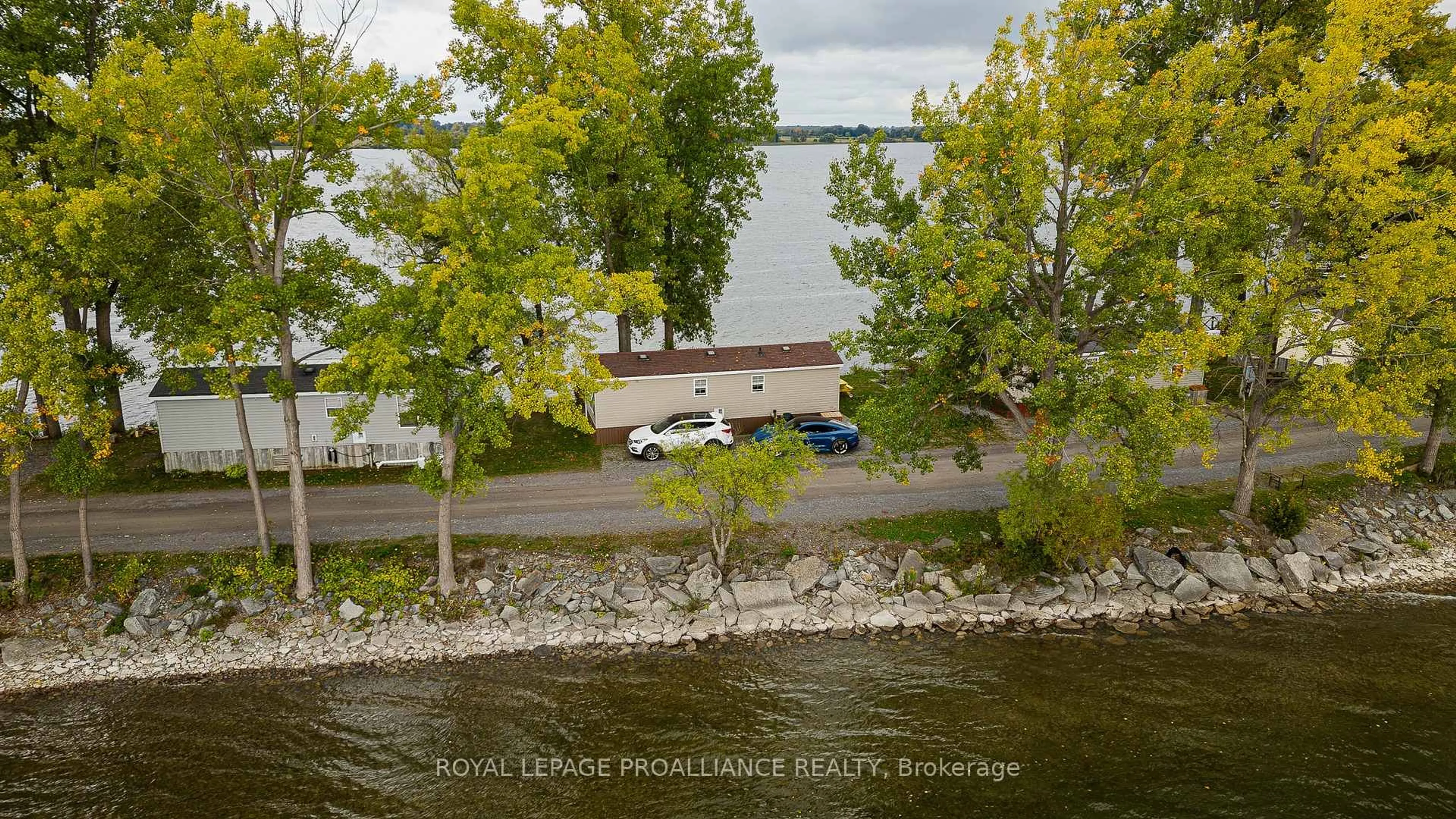 A pic from outside/outdoor area/front of a property/back of a property/a pic from drone, water/lake/river/ocean view for 486 Cty Rd 18 64 Cherry Beach Lane, Prince Edward County Ontario K0K 2T0