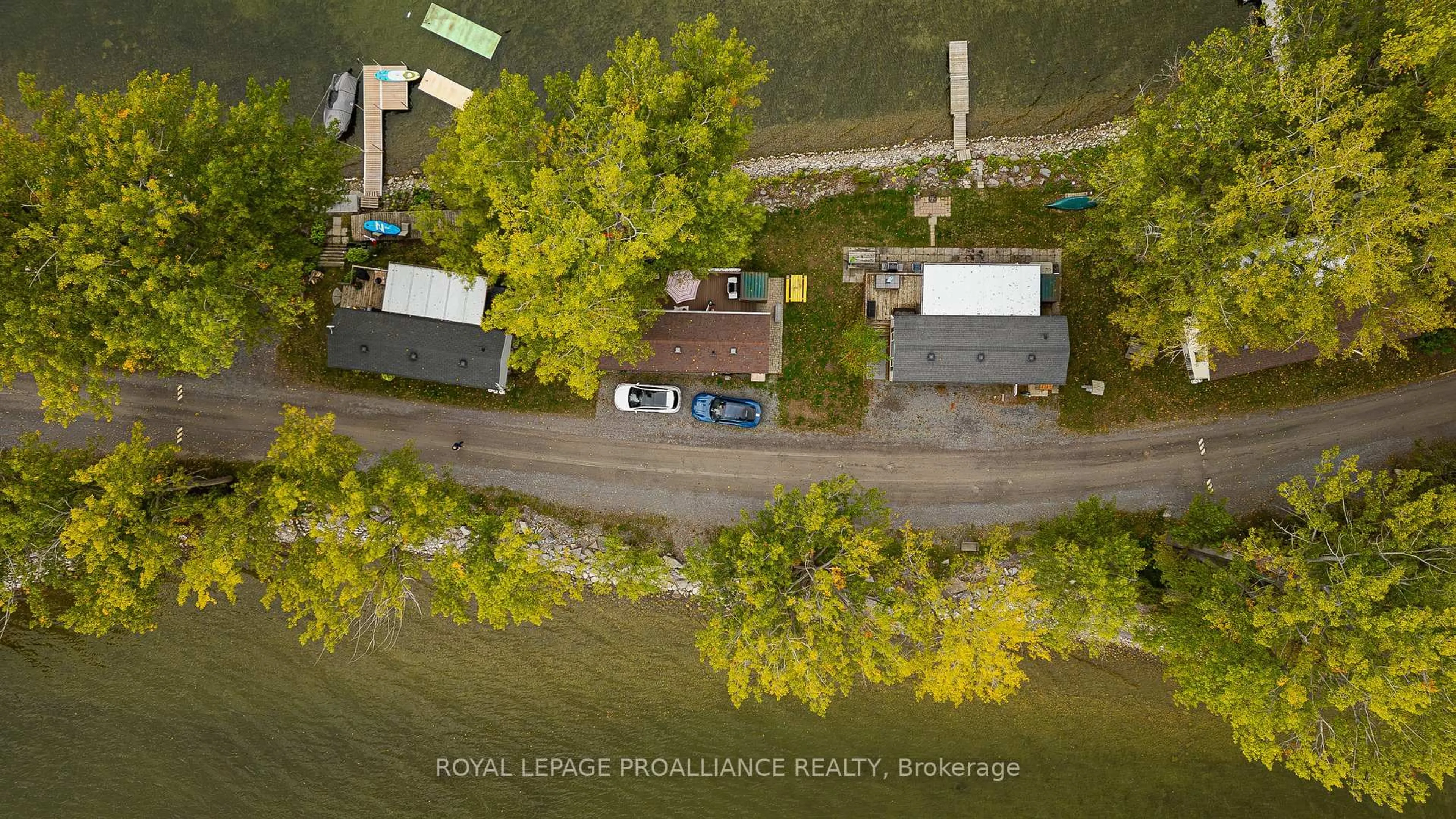 A pic from outside/outdoor area/front of a property/back of a property/a pic from drone, street for 486 Cty Rd 18 64 Cherry Beach Lane, Prince Edward County Ontario K0K 2T0