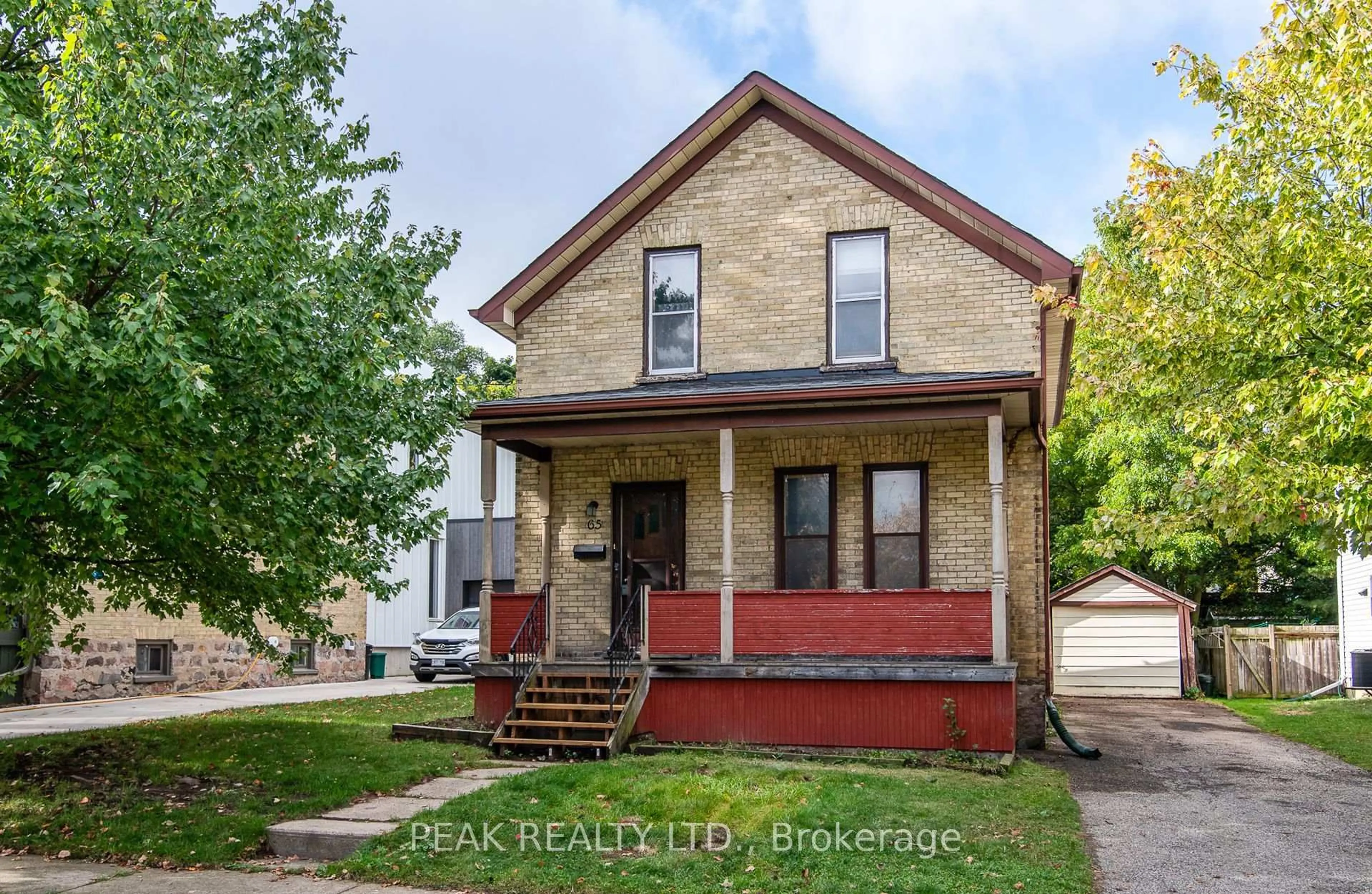 Home with brick exterior material, street for 65 Short St, Waterloo Ontario N2L 1X9