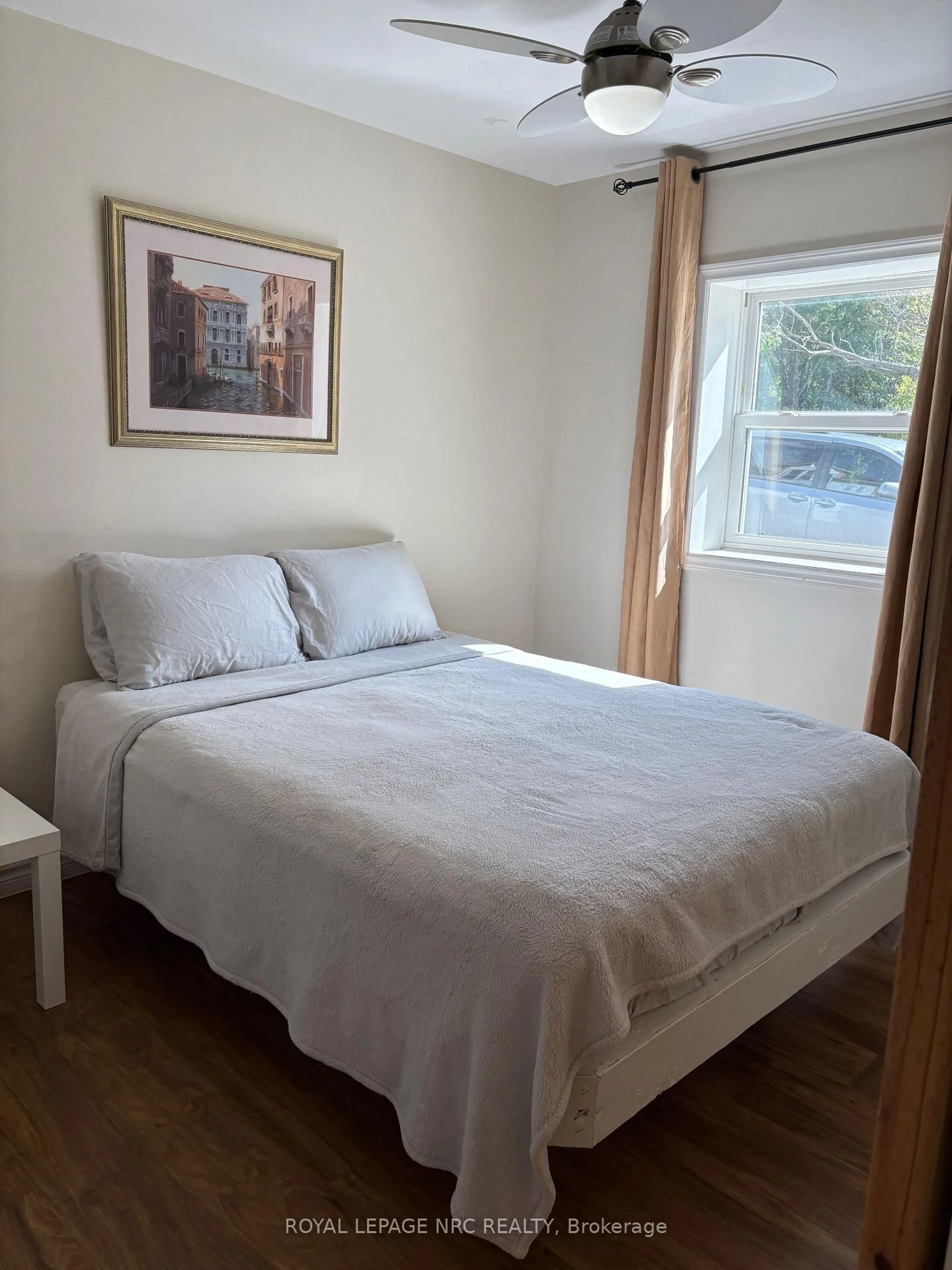 Bedroom with bed, wood/laminate floor for 375 Almond Lane, St. Catharines Ontario L2T 1B9