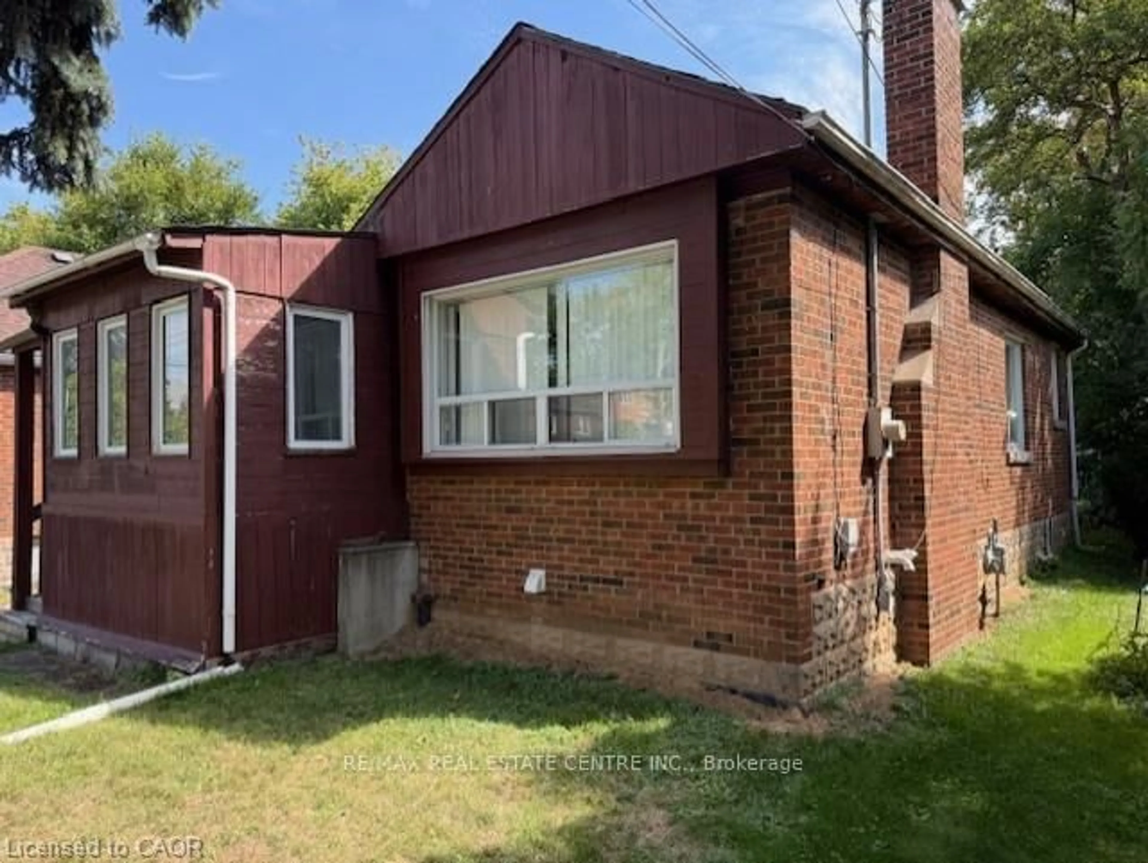 Home with brick exterior material, street for 77 Emerson St, Hamilton Ontario L8S 2X5