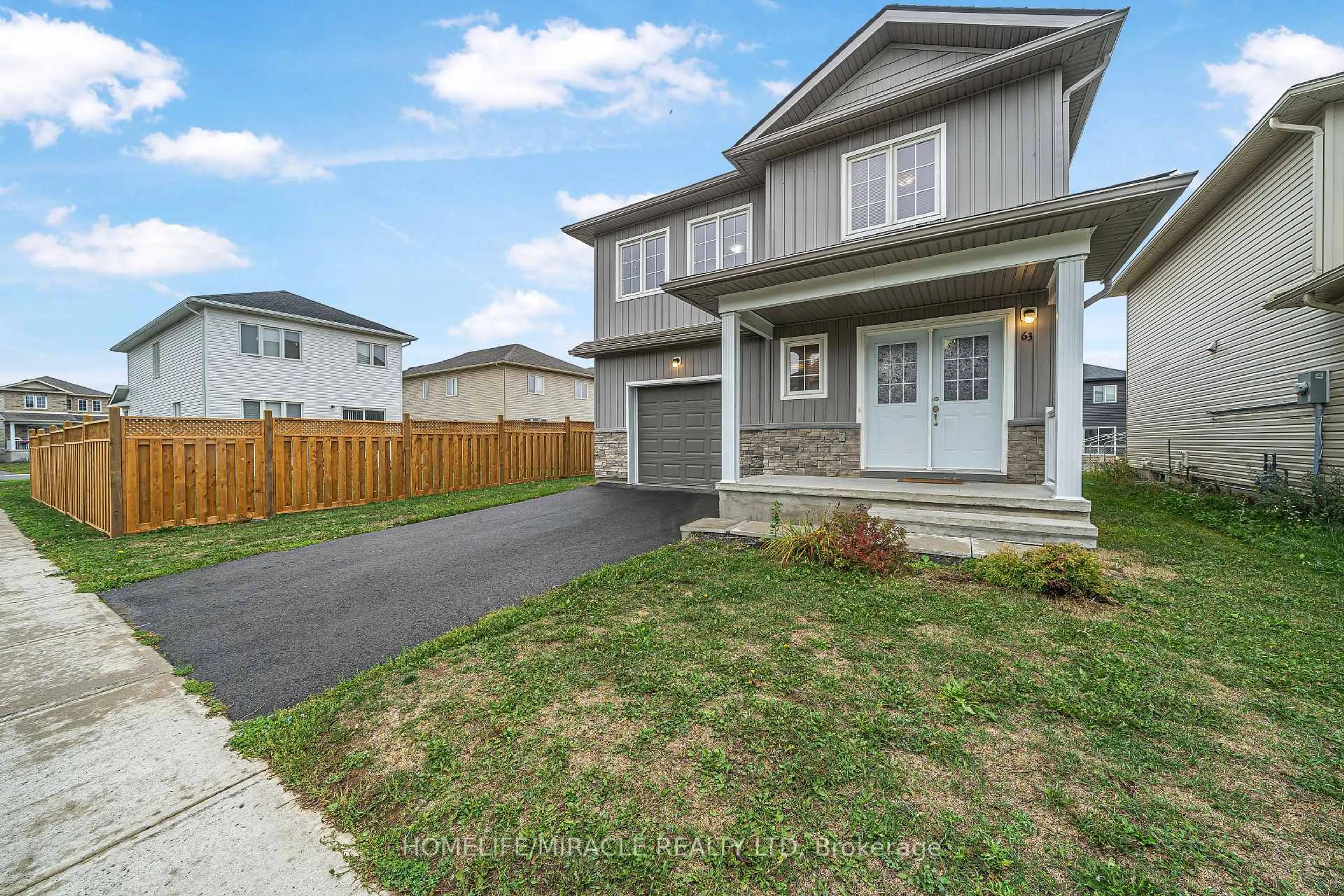 Home with vinyl exterior material, street for 63 Brennan Cres, Bissett Creek Ontario K0H 2H0