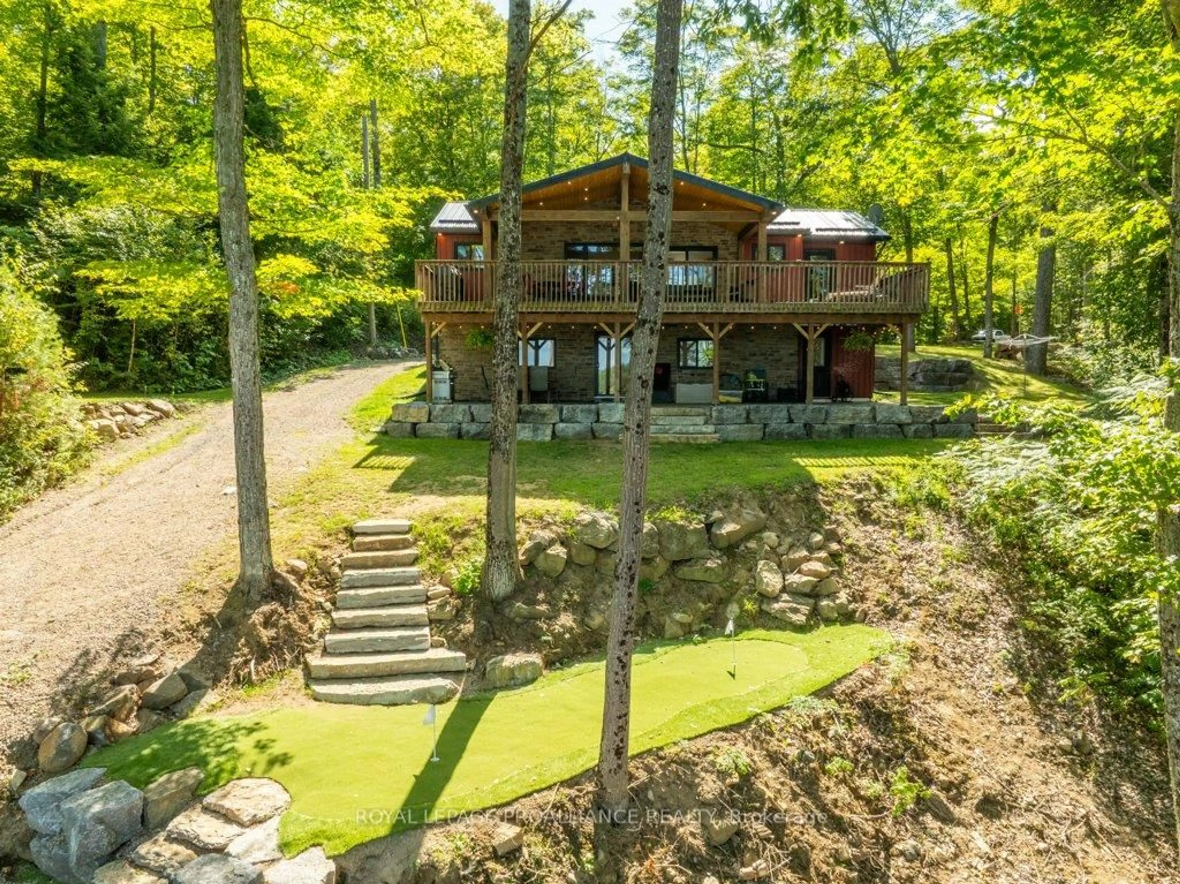 A pic from outside/outdoor area/front of a property/back of a property/a pic from drone, water/lake/river/ocean view for 1202 Rocky Lane, Cloyne Ontario K0H 1K0