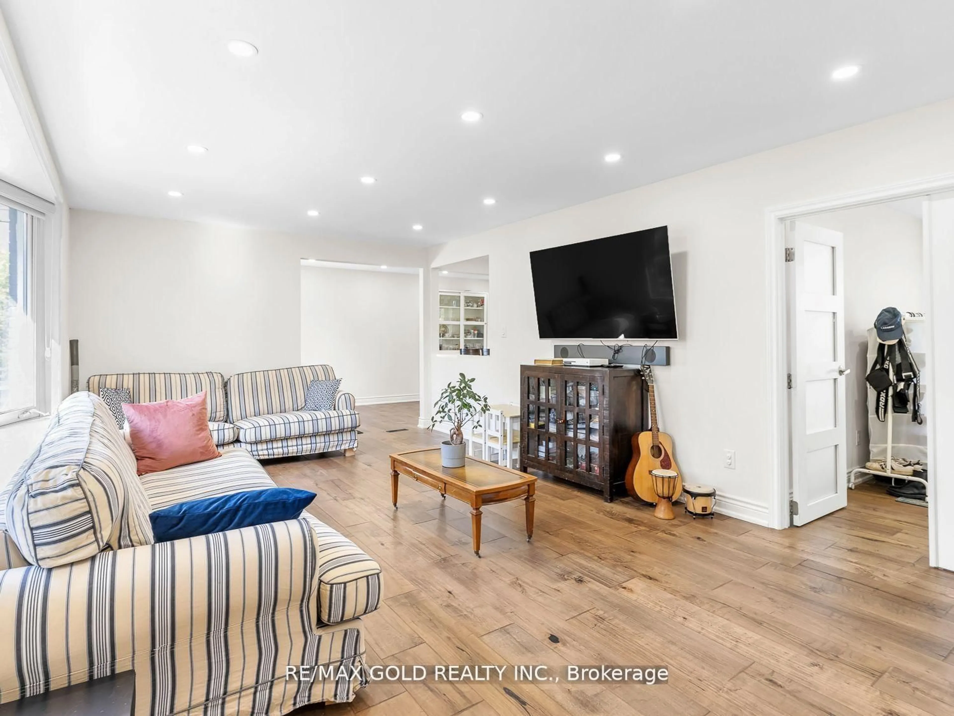 Living room with furniture, wood/laminate floor for 8017 Highway 7, Guelph/Eramosa Ontario N1H 6H8