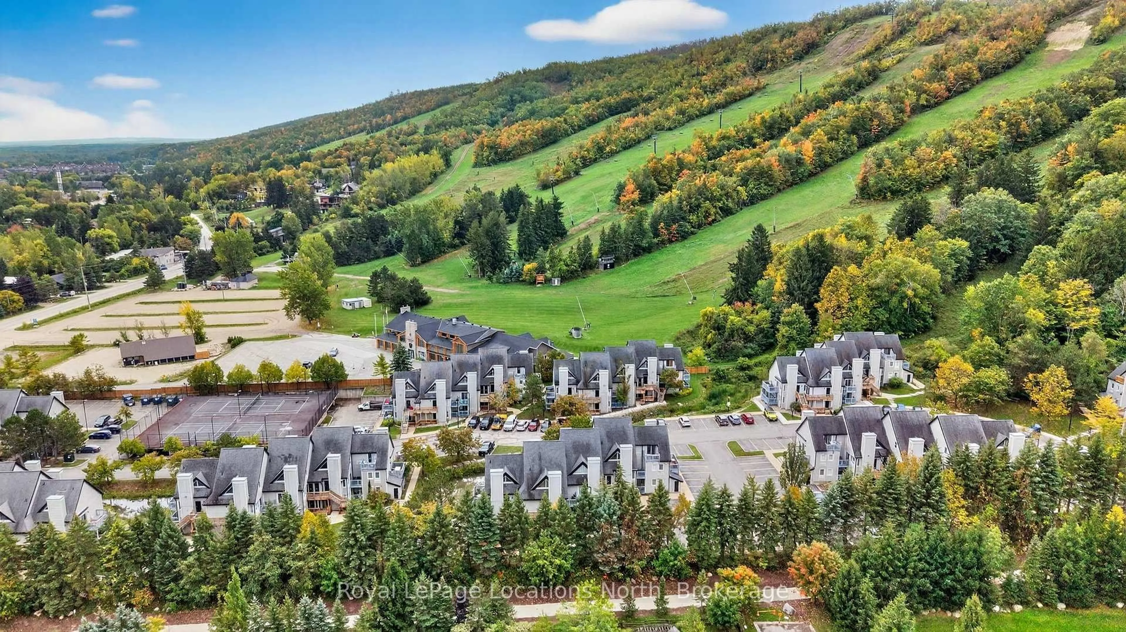 A pic from outside/outdoor area/front of a property/back of a property/a pic from drone, mountain view for 796468 Grey 19 Rd #508, Blue Mountains Ontario L9Y 0N6