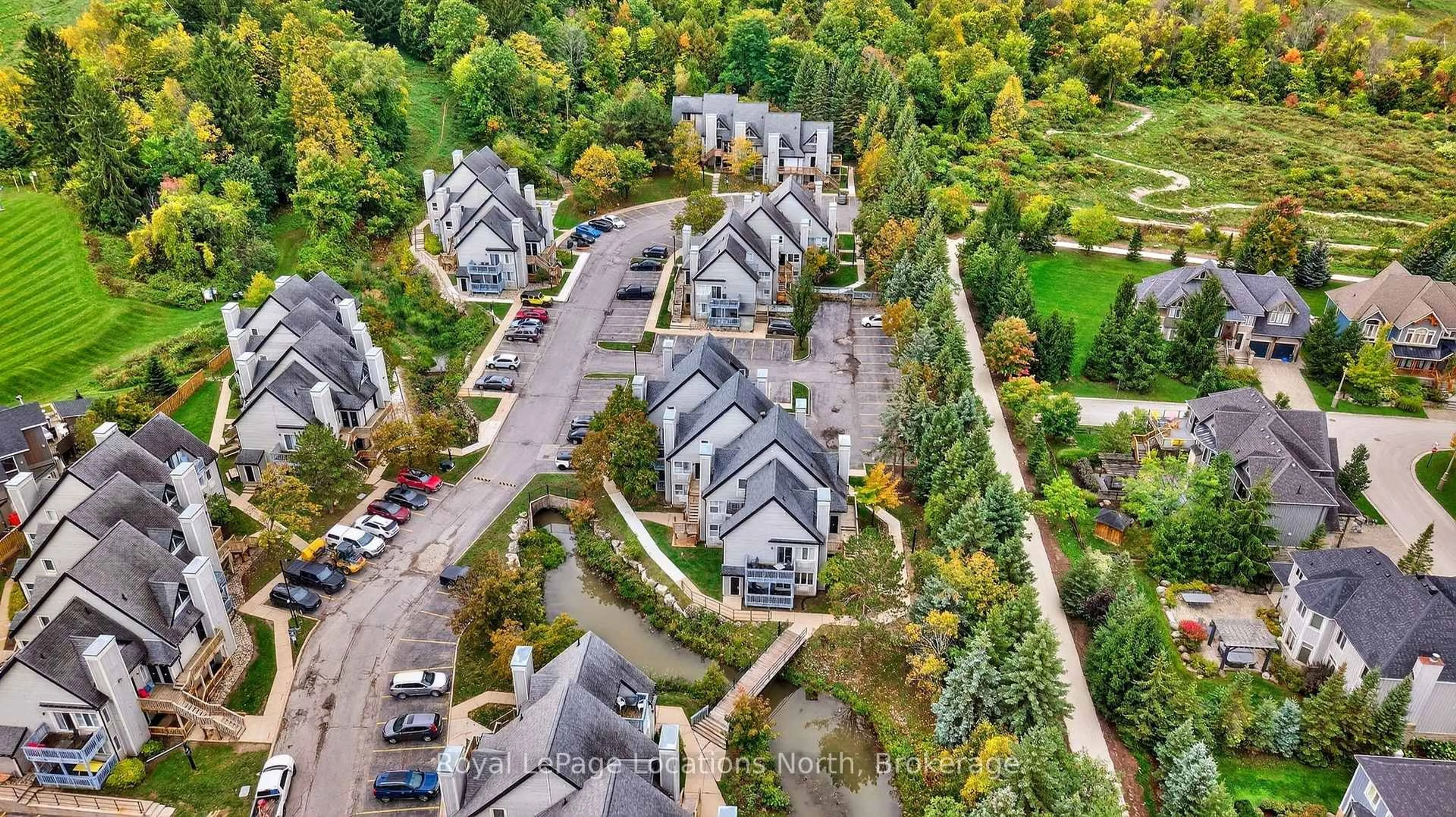 A pic from outside/outdoor area/front of a property/back of a property/a pic from drone, street for 796468 Grey 19 Rd #508, Blue Mountains Ontario L9Y 0N6