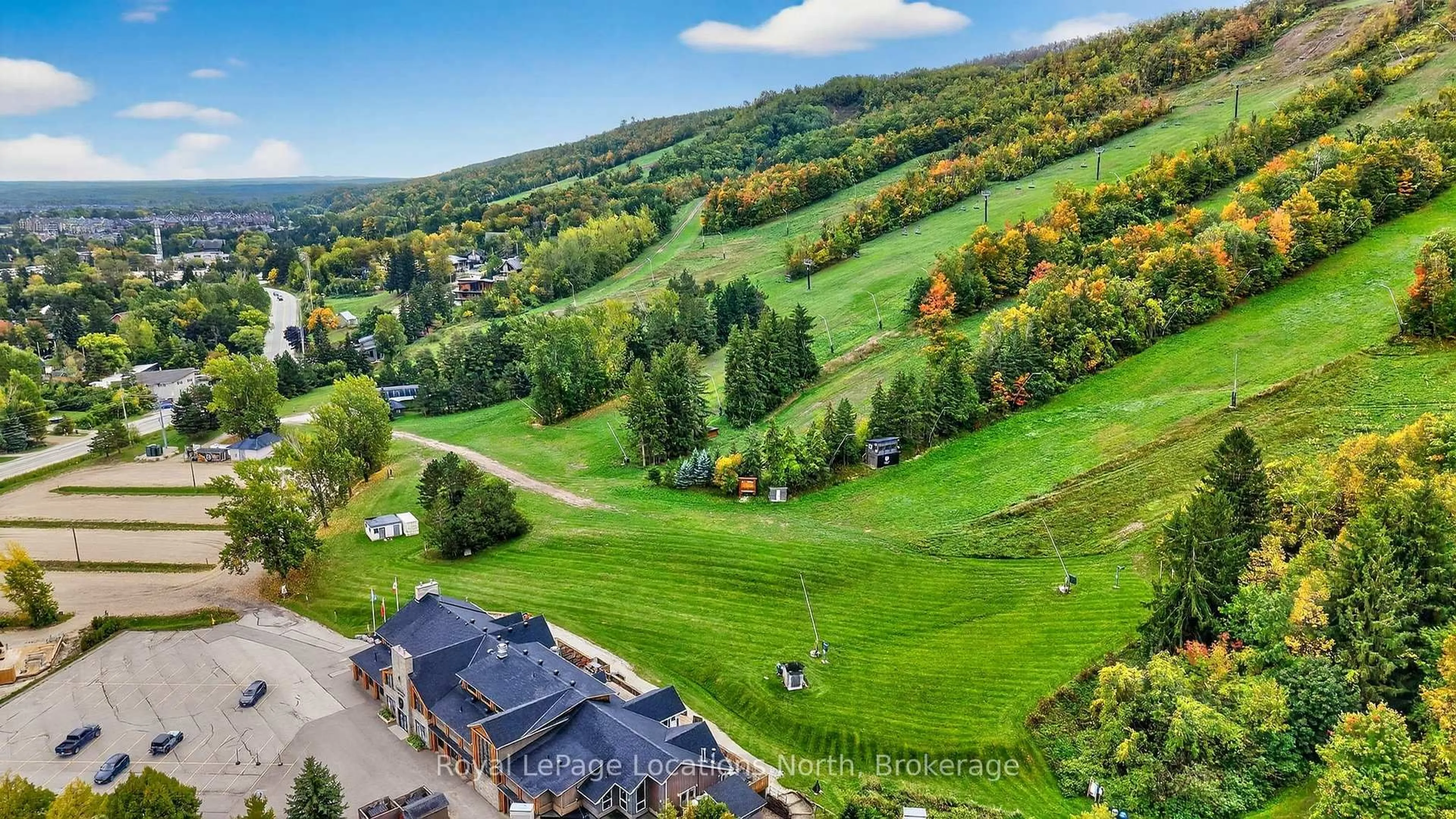 A pic from outside/outdoor area/front of a property/back of a property/a pic from drone, mountain view for 796468 Grey 19 Rd #508, Blue Mountains Ontario L9Y 0N6