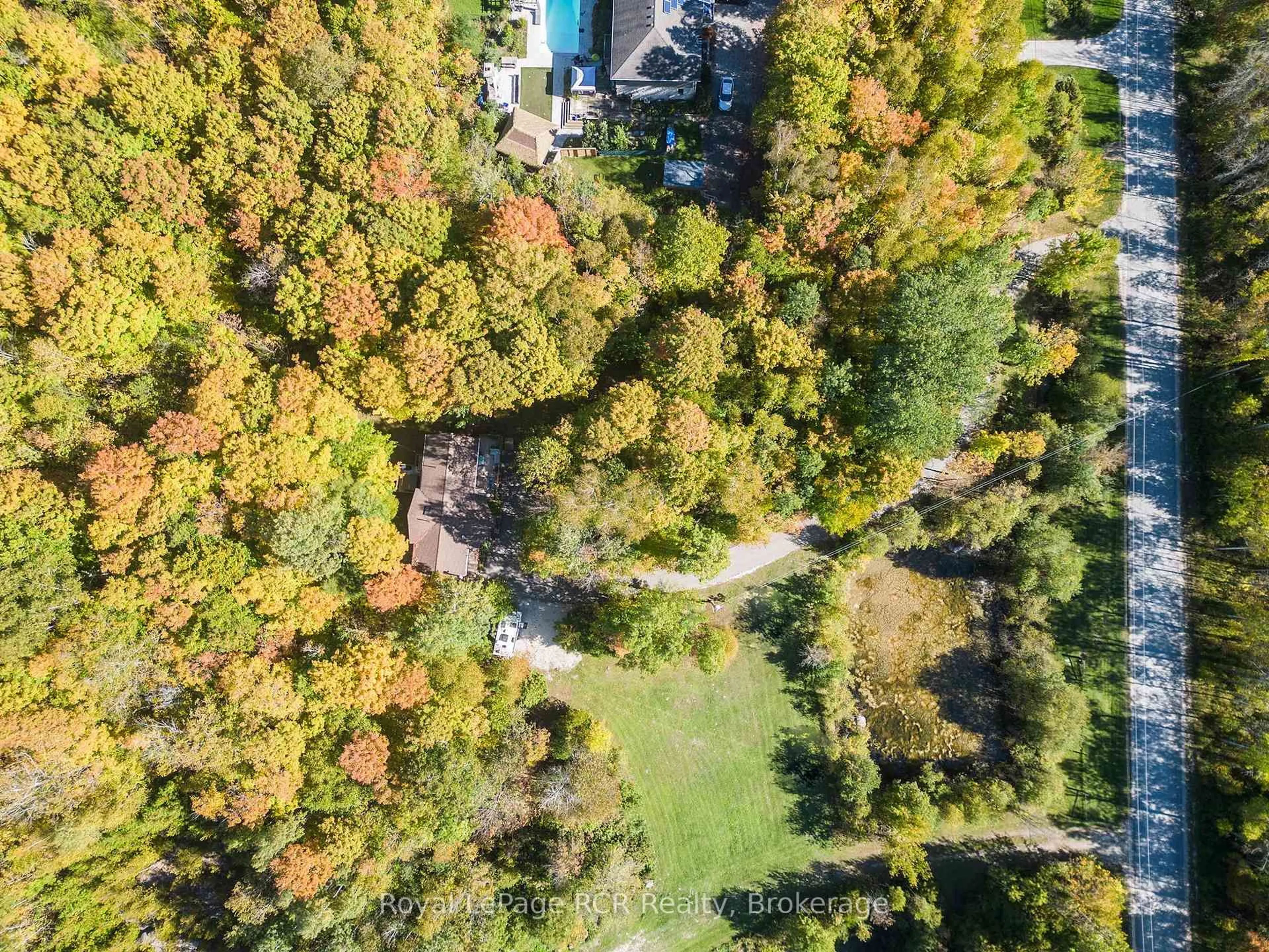 A pic from outside/outdoor area/front of a property/back of a property/a pic from drone, forest/trees view for 758341 Girl Guide Rd, Georgian Bluffs Ontario N4K 5N7