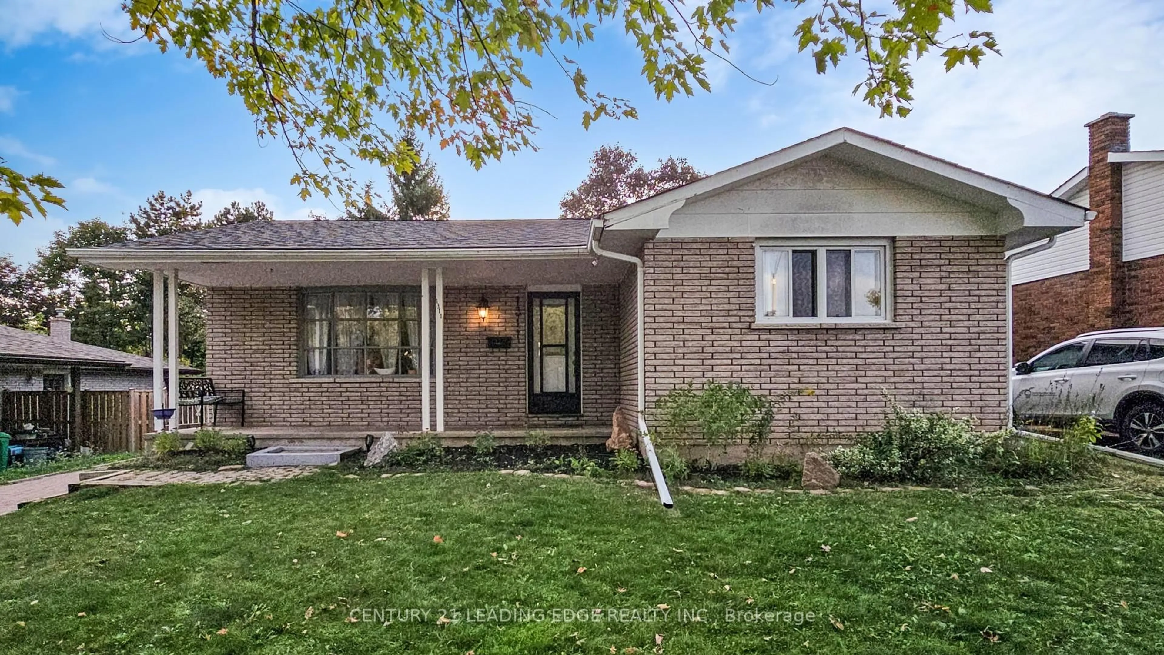 Home with brick exterior material, street for 1311 Cartier Blvd, Peterborough Ontario K9H 6S4