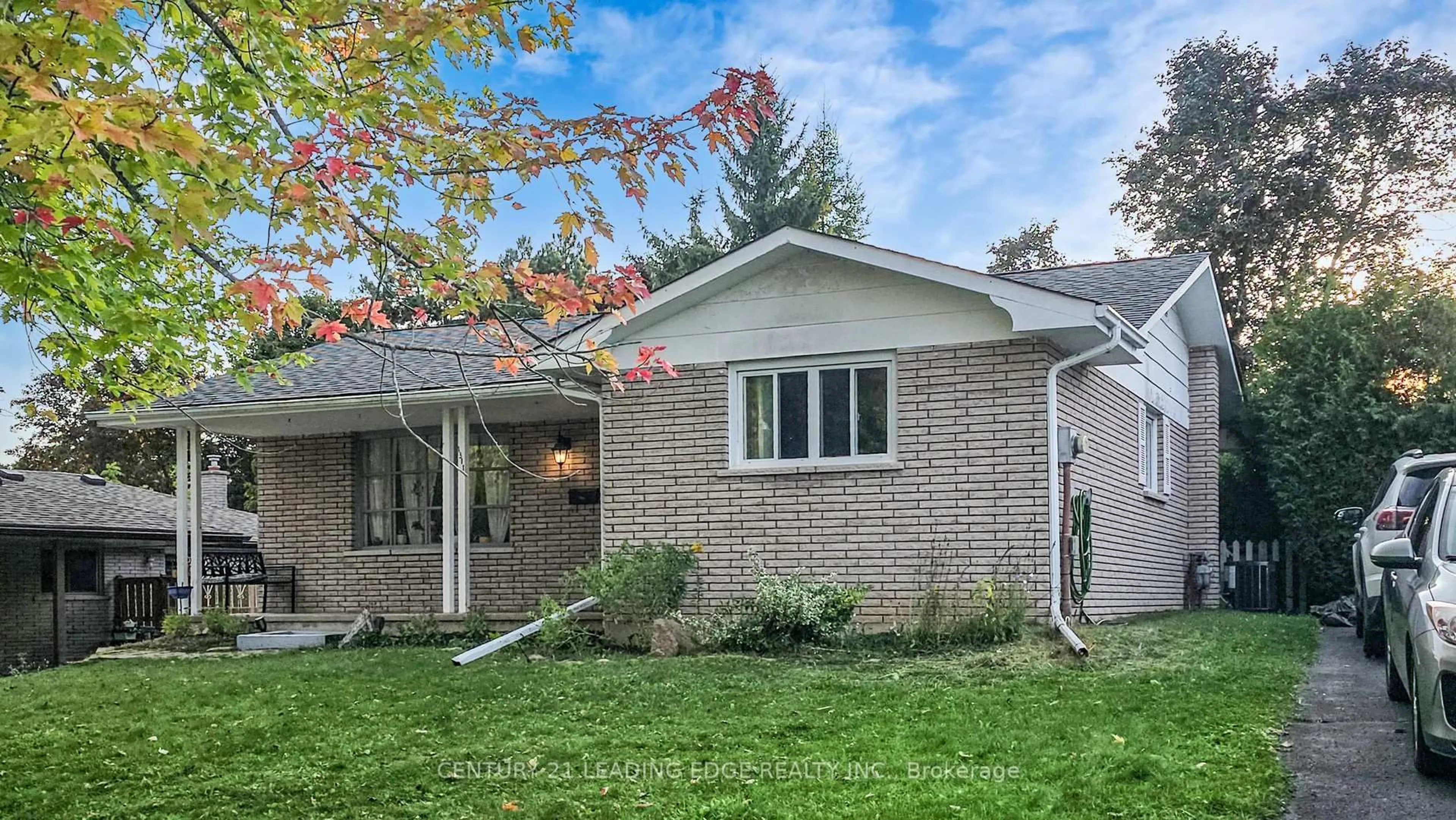 Home with brick exterior material, street for 1311 Cartier Blvd, Peterborough Ontario K9H 6S4