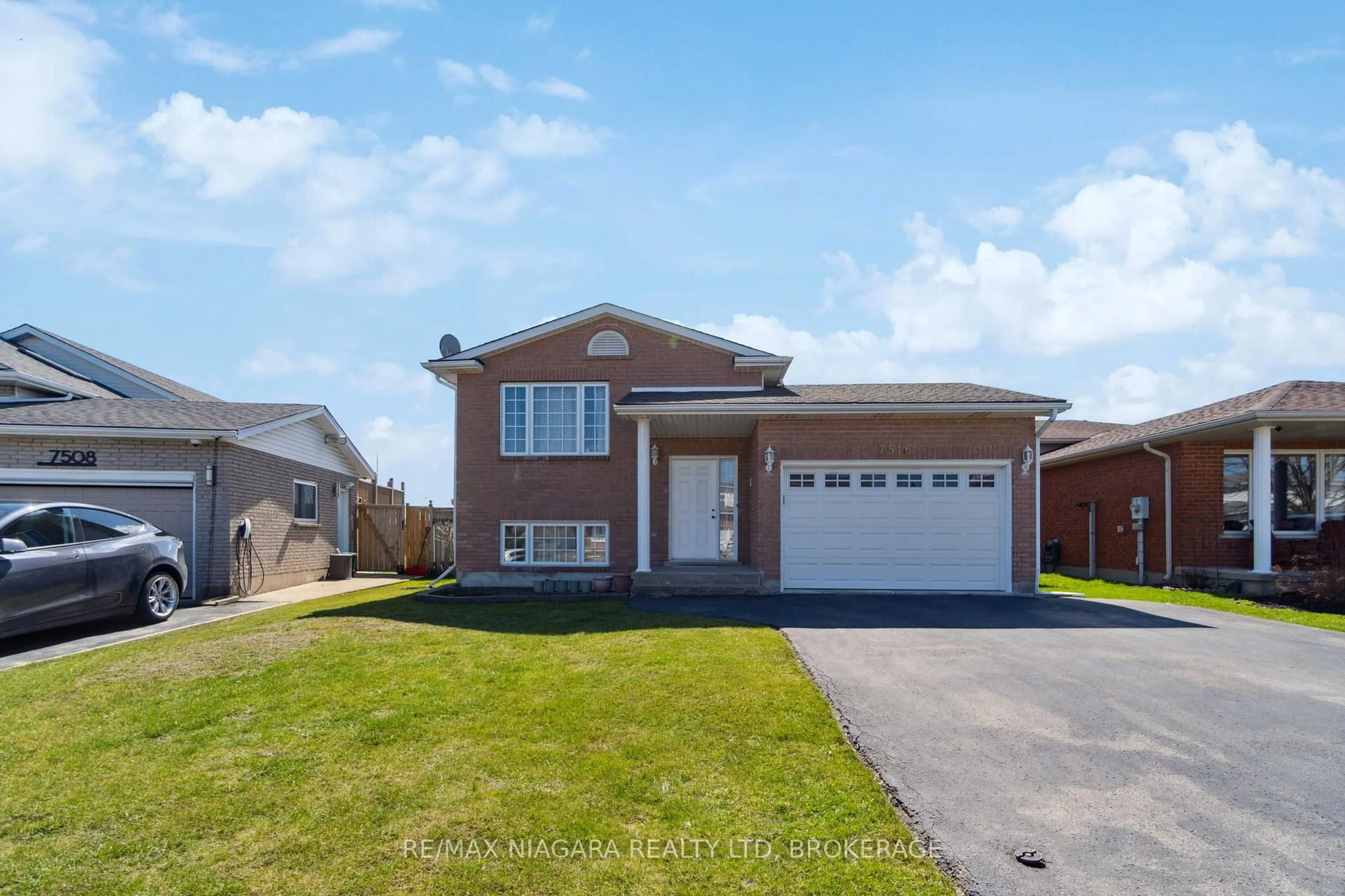 Home with brick exterior material, street for 7516 Monastery Dr, Niagara Falls Ontario L2H 3A7