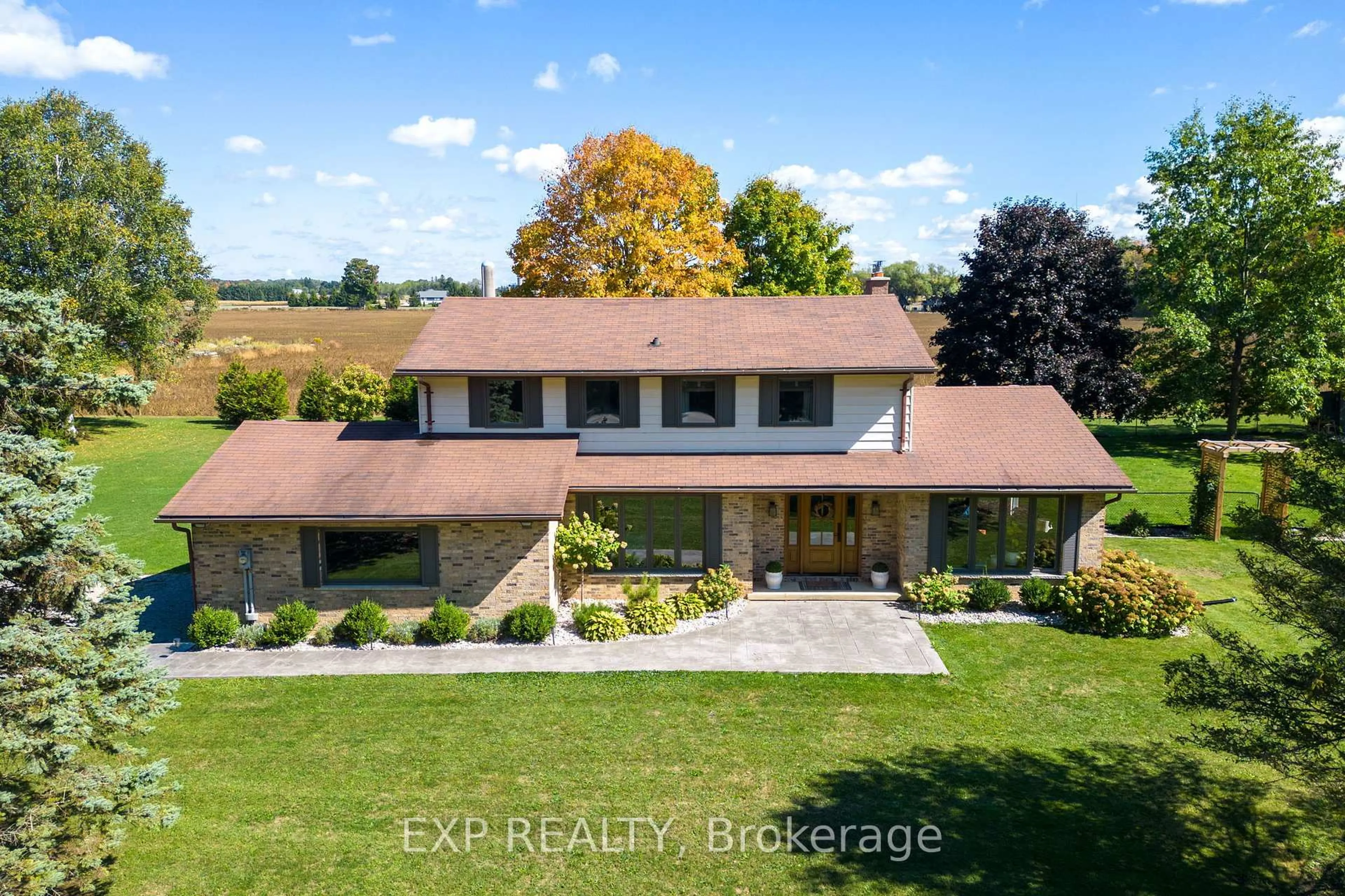 A pic from outside/outdoor area/front of a property/back of a property/a pic from drone, unknown for 22882 Vanneck Rd, Middlesex Centre Ontario N0M 2A0