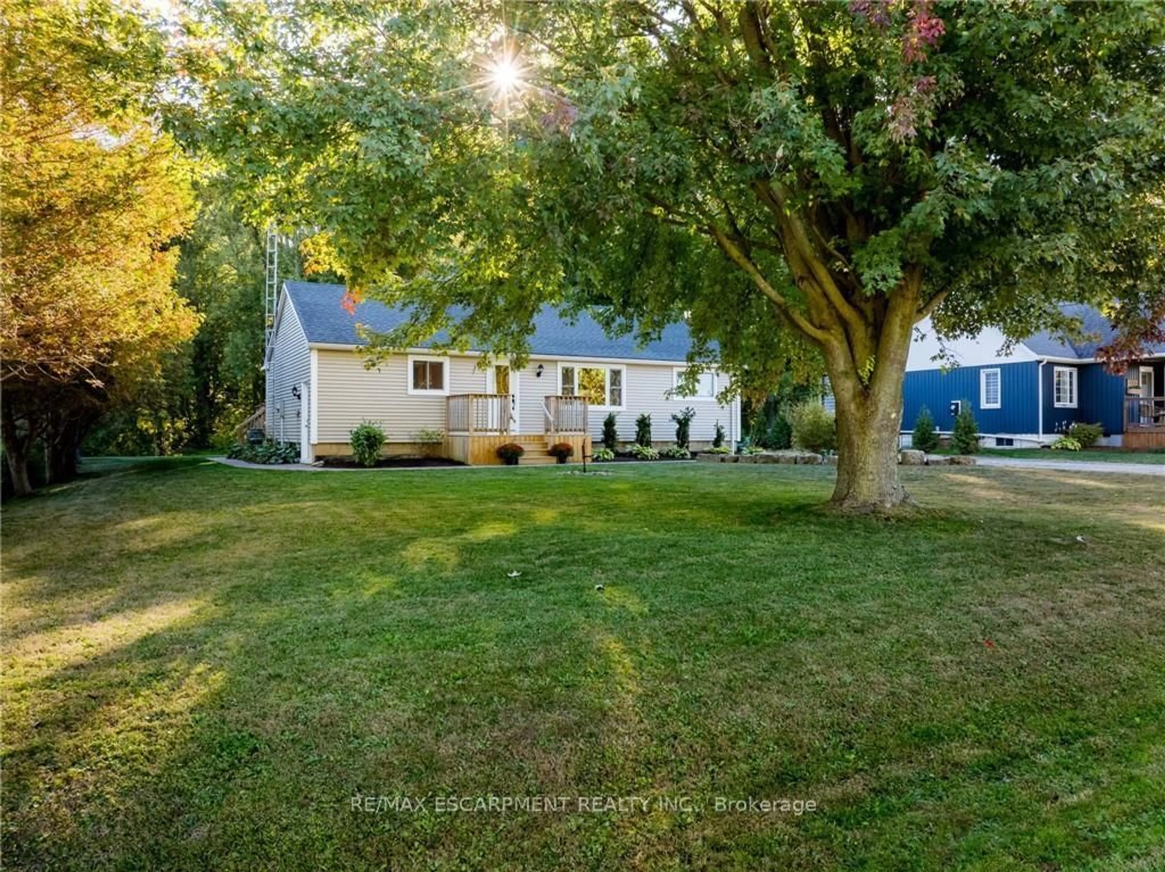 A pic from outside/outdoor area/front of a property/back of a property/a pic from drone, street for 52877 Putman Rd, Wainfleet Ontario L0S 1V0