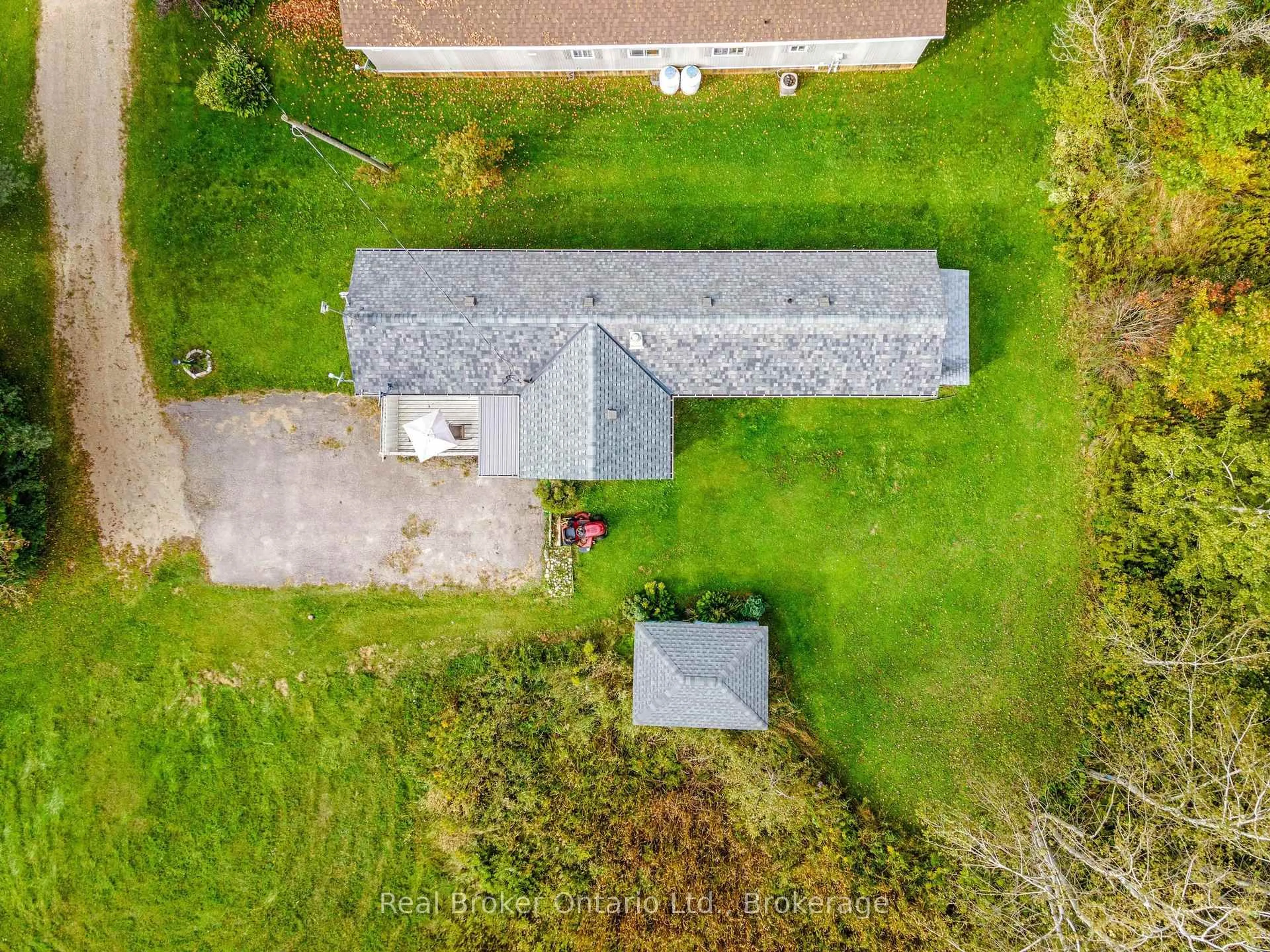 A pic from outside/outdoor area/front of a property/back of a property/a pic from drone, unknown for 026585 89 Highway #31, Southgate Ontario N0C 1B0