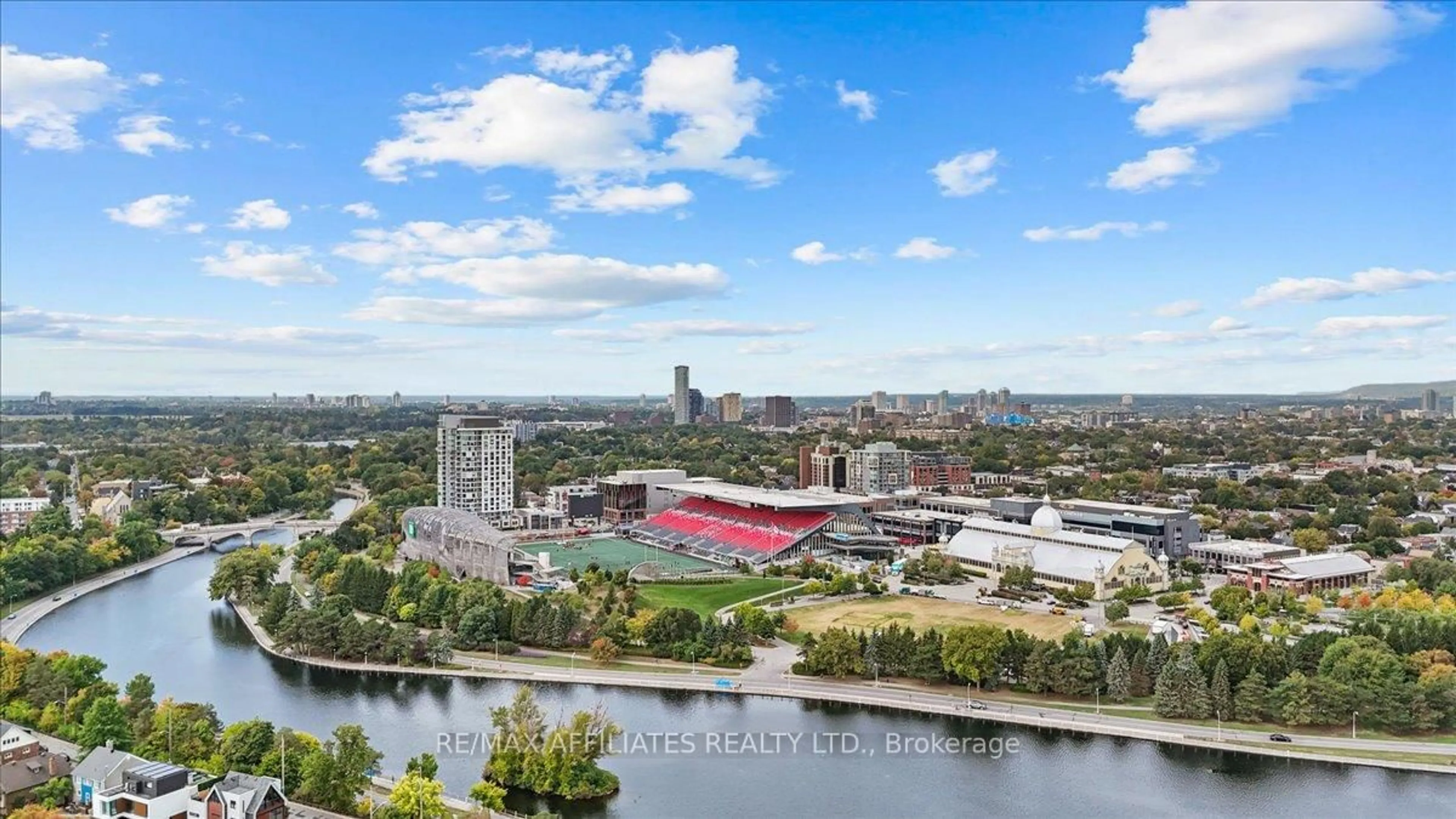 A pic from outside/outdoor area/front of a property/back of a property/a pic from drone, water/lake/river/ocean view for 1035 Bank St #406, Ottawa Ontario K1S 3W9