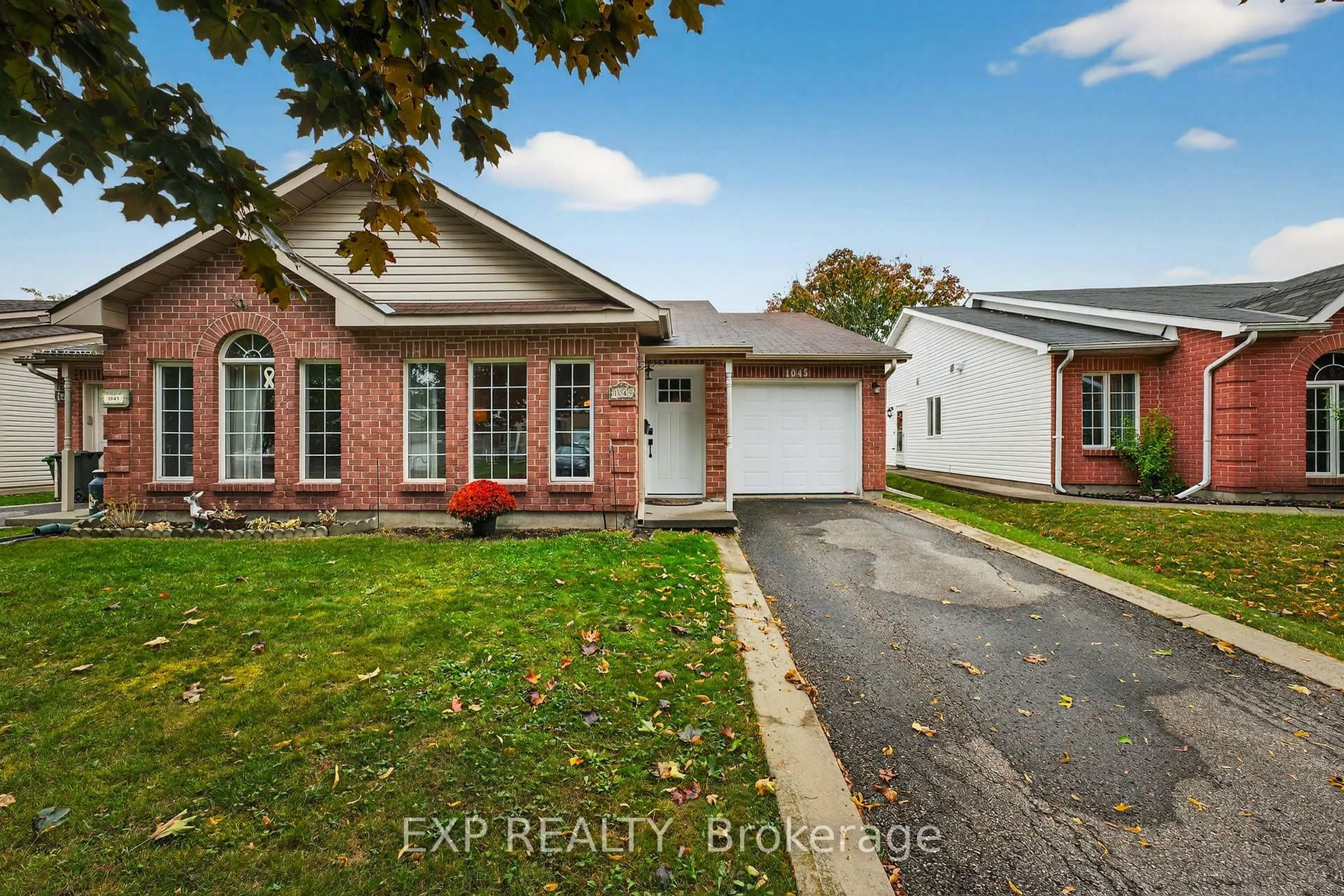 Home with brick exterior material, street for 1045 Springfield Dr, Kingston Ontario K7M 8V6