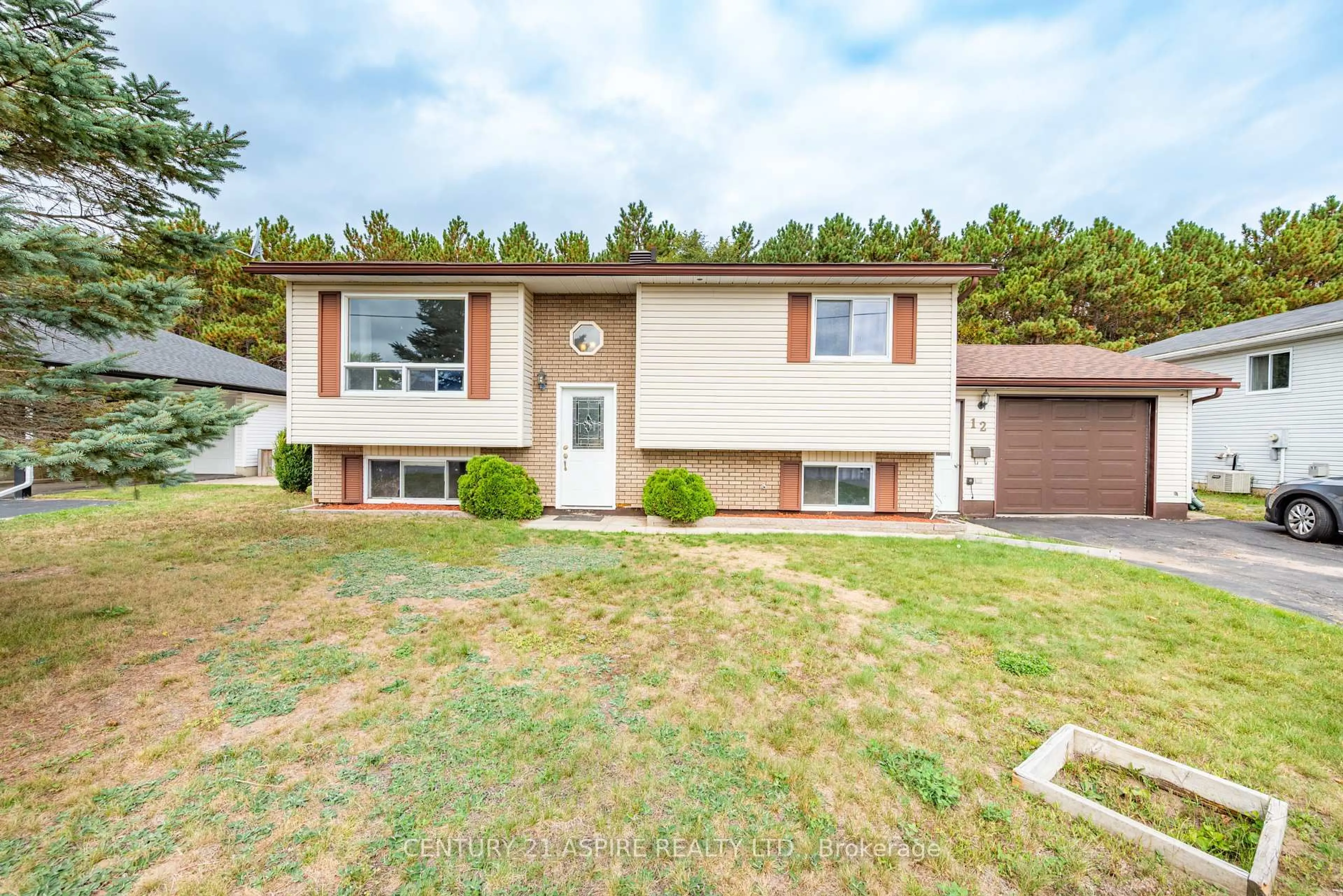 Home with vinyl exterior material, street for 12 Dutch Dr, Petawawa Ontario K8H 3M2