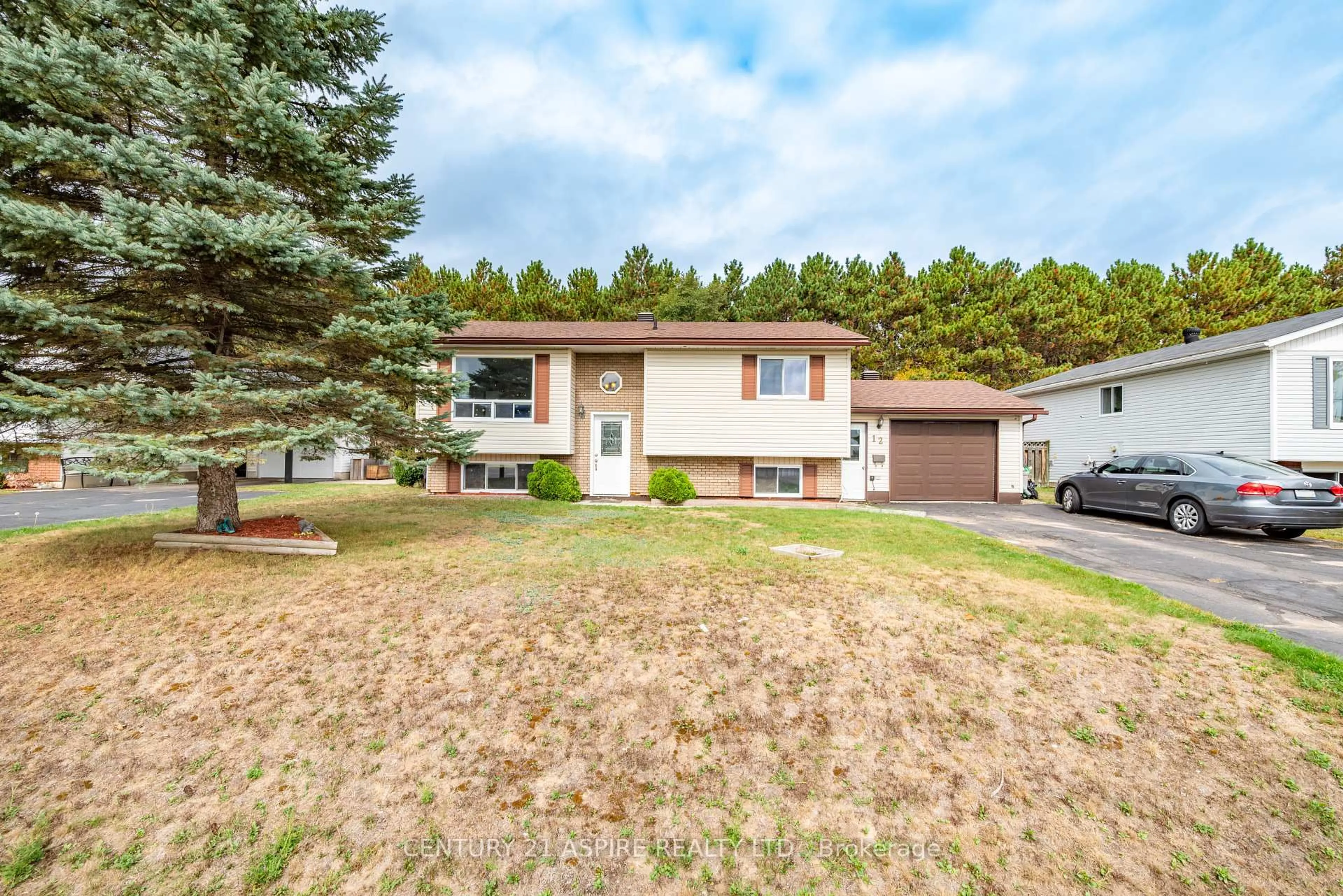 Home with vinyl exterior material, street for 12 Dutch Dr, Petawawa Ontario K8H 3M2
