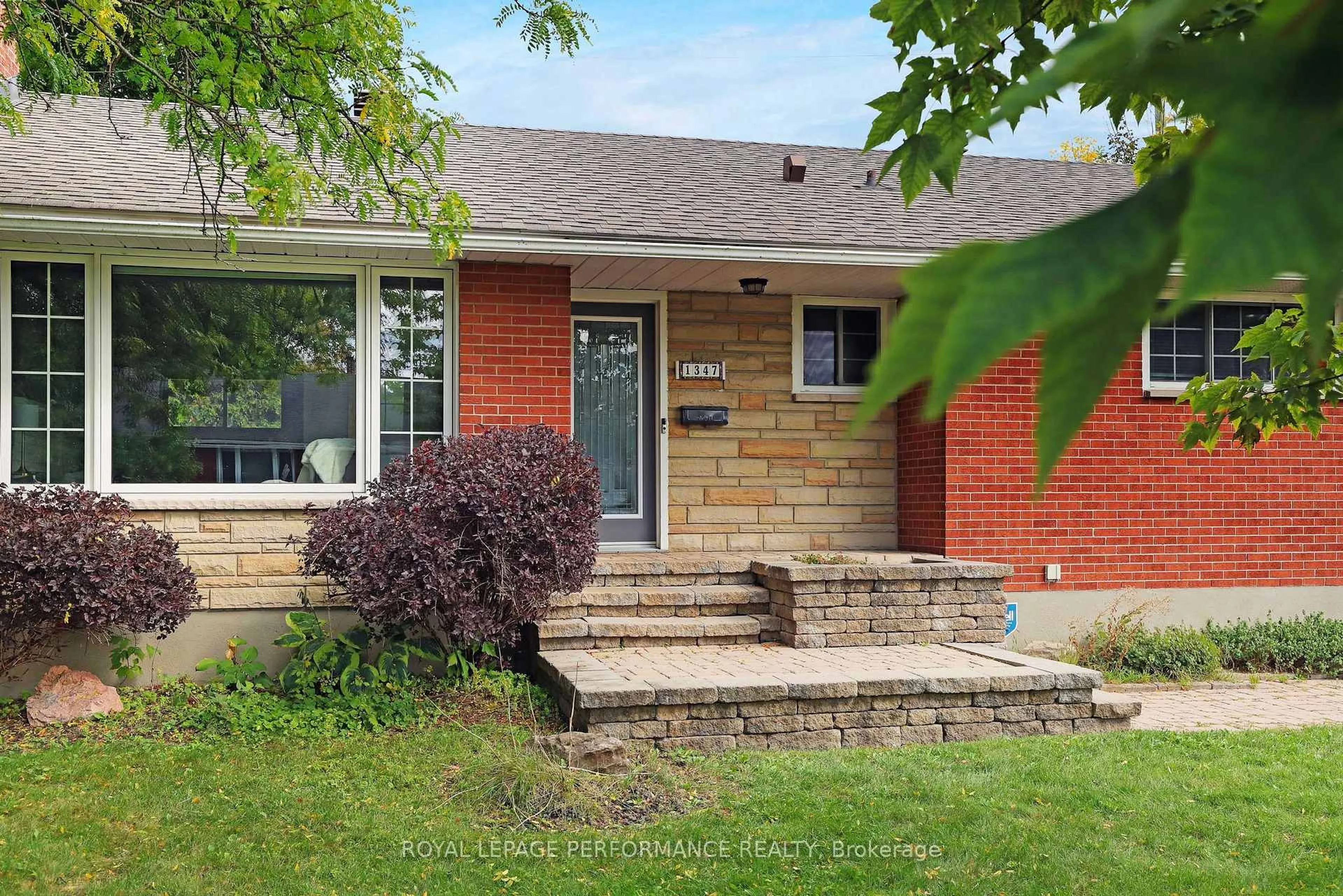 Home with brick exterior material, street for 1347 Highgate Rd, Ottawa Ontario K2C 2Y5