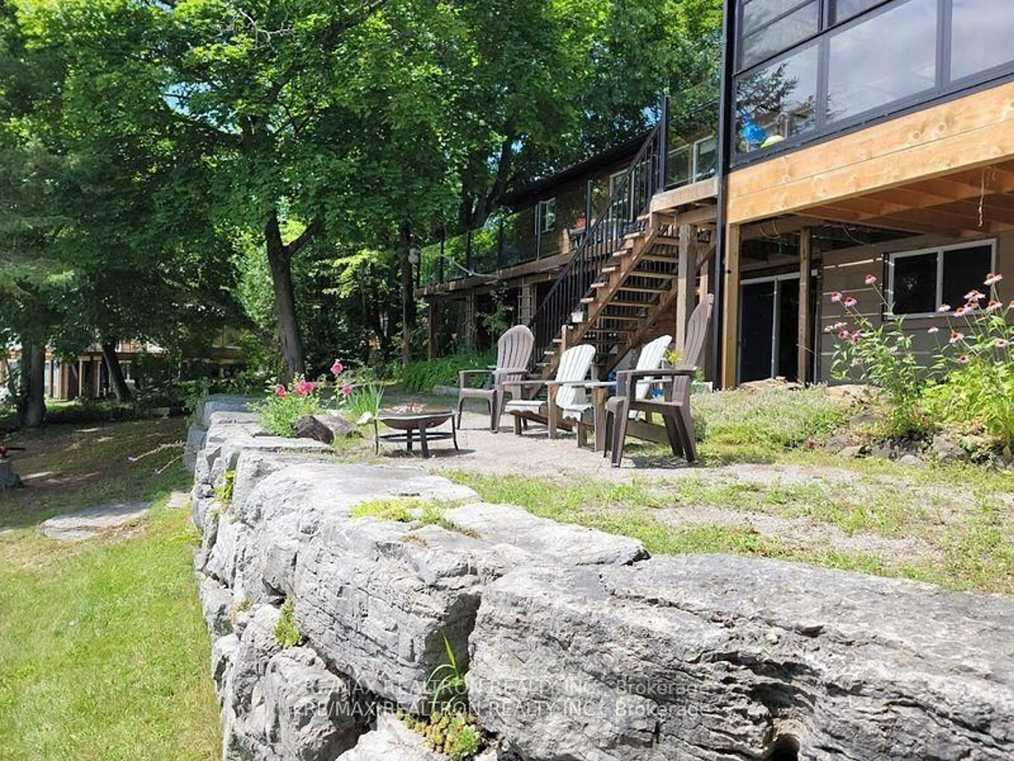 A pic from outside/outdoor area/front of a property/back of a property/a pic from drone, unknown for 103 Peninsula Dr, Trent Lakes Ontario K0M 1A0
