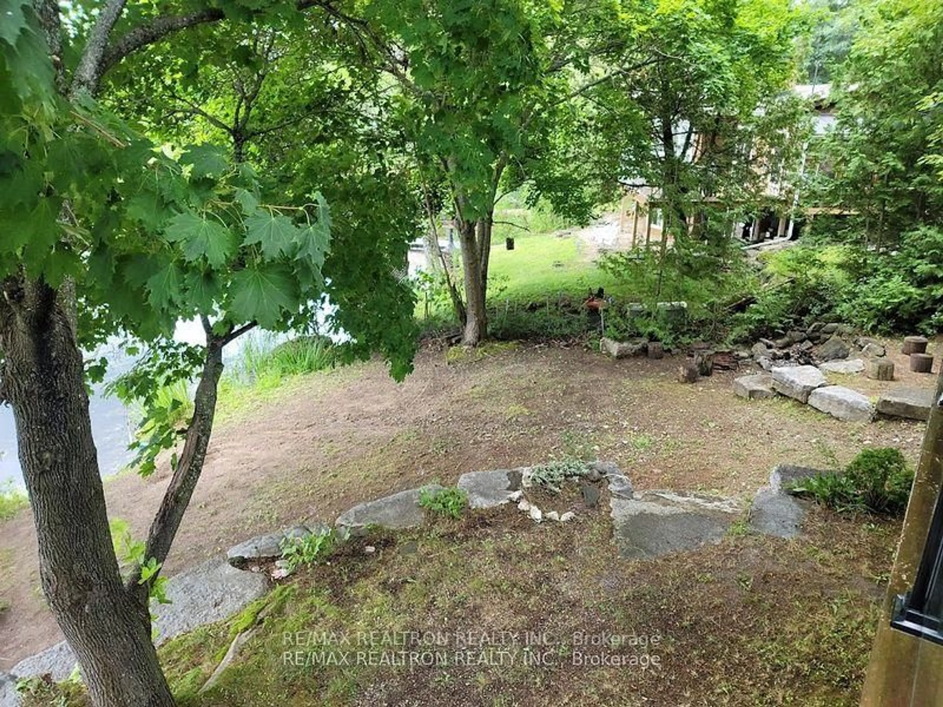 A pic from outside/outdoor area/front of a property/back of a property/a pic from drone, water/lake/river/ocean view for 103 Peninsula Dr, Trent Lakes Ontario K0M 1A0