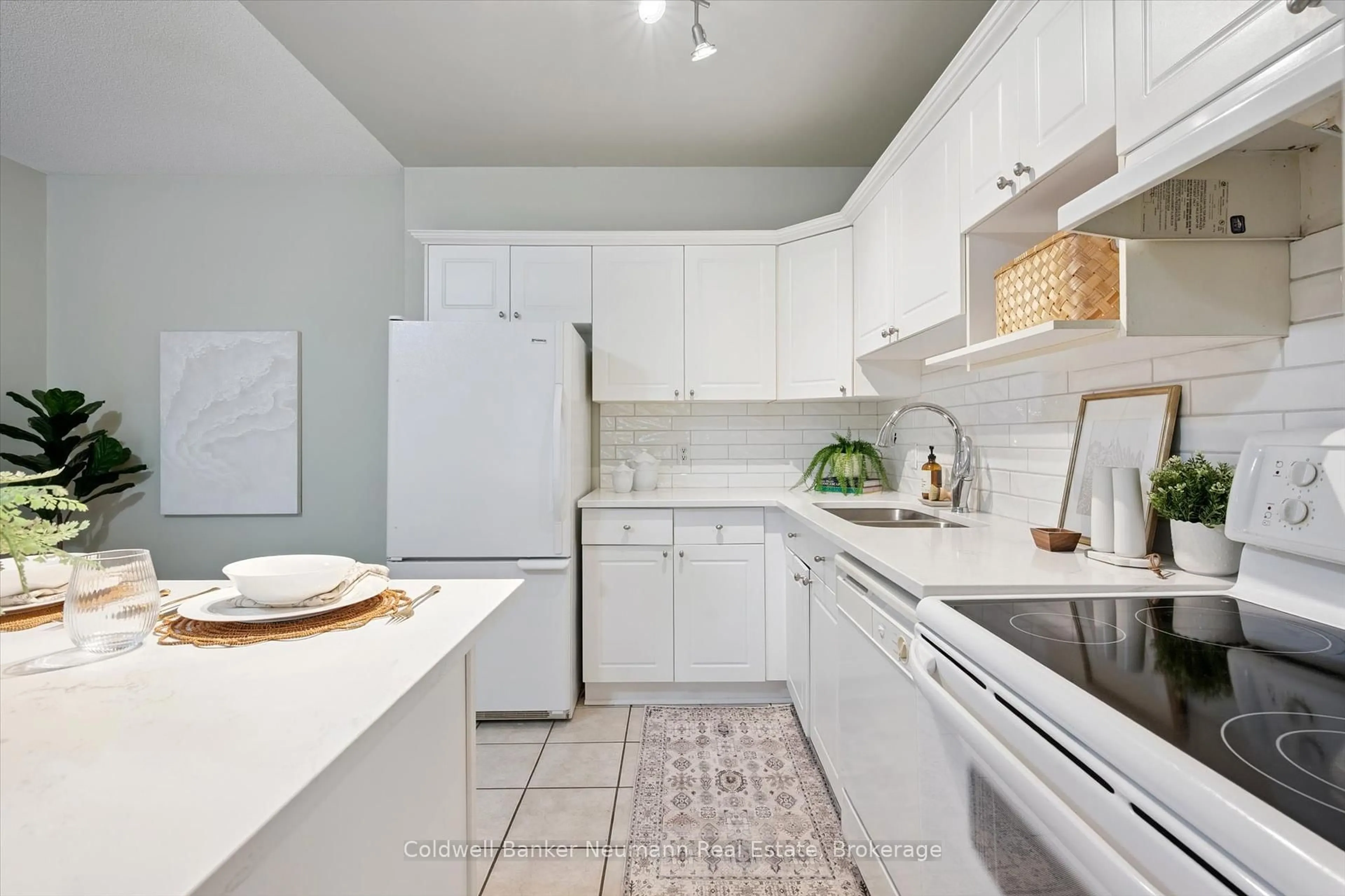 Standard kitchen, ceramic/tile floor for 60 Wyndham St #206, Guelph Ontario N1E 7H7