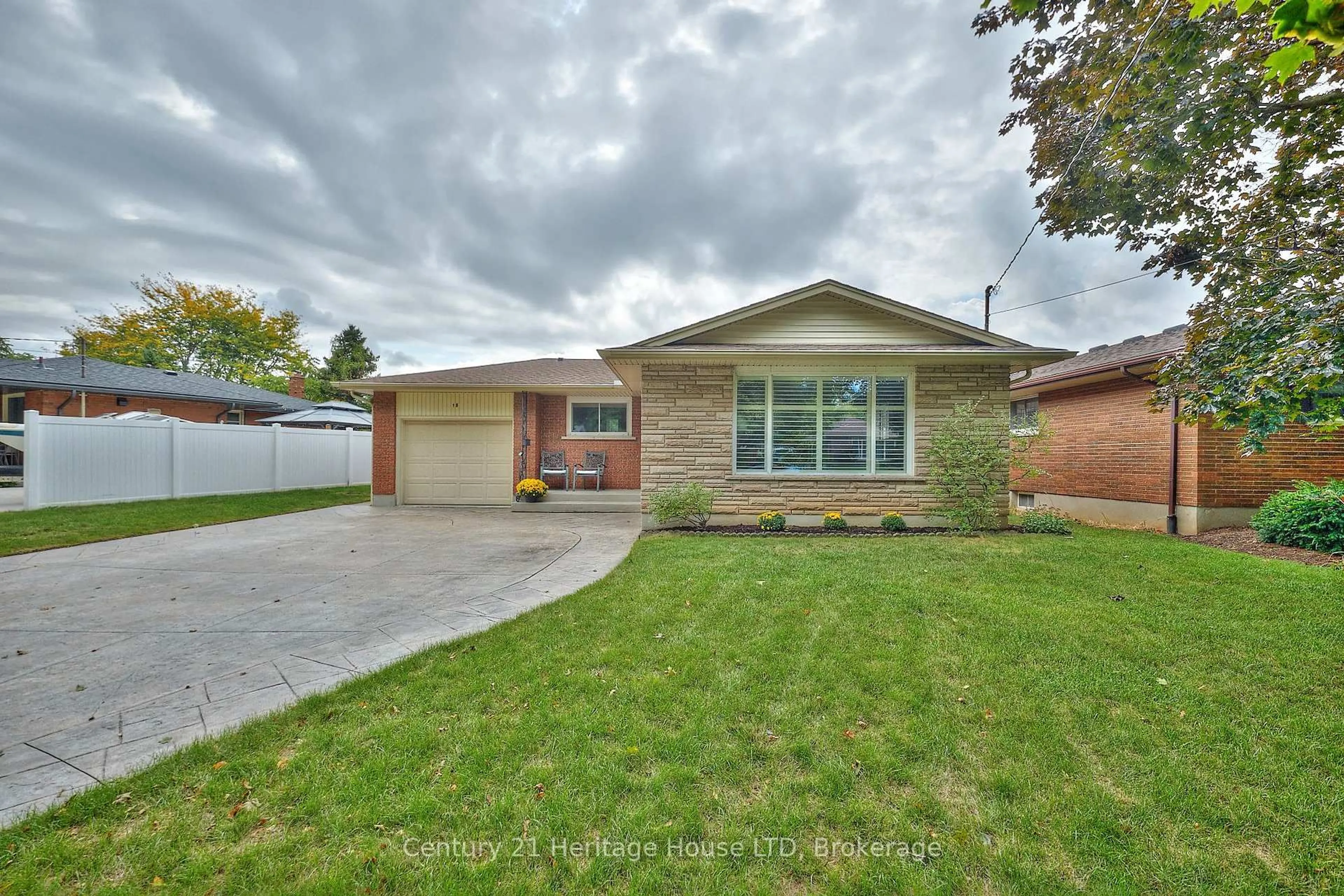 Home with brick exterior material, street for 18 Princeway Dr, St. Catharines Ontario L2N 2X6