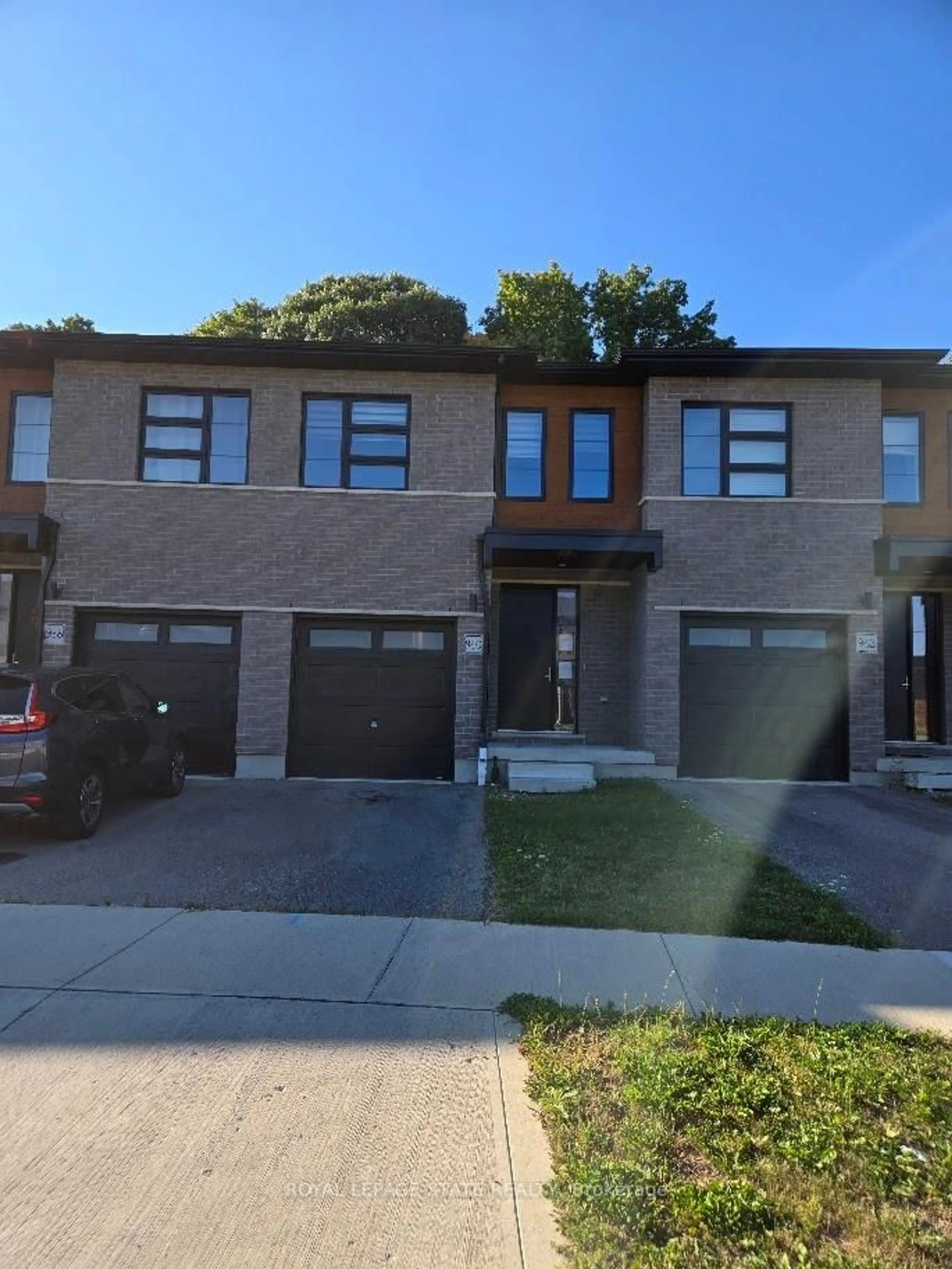 Home with brick exterior material, street for 940 Robert Ferrie Dr, Kitchener Ontario N2R 0P9