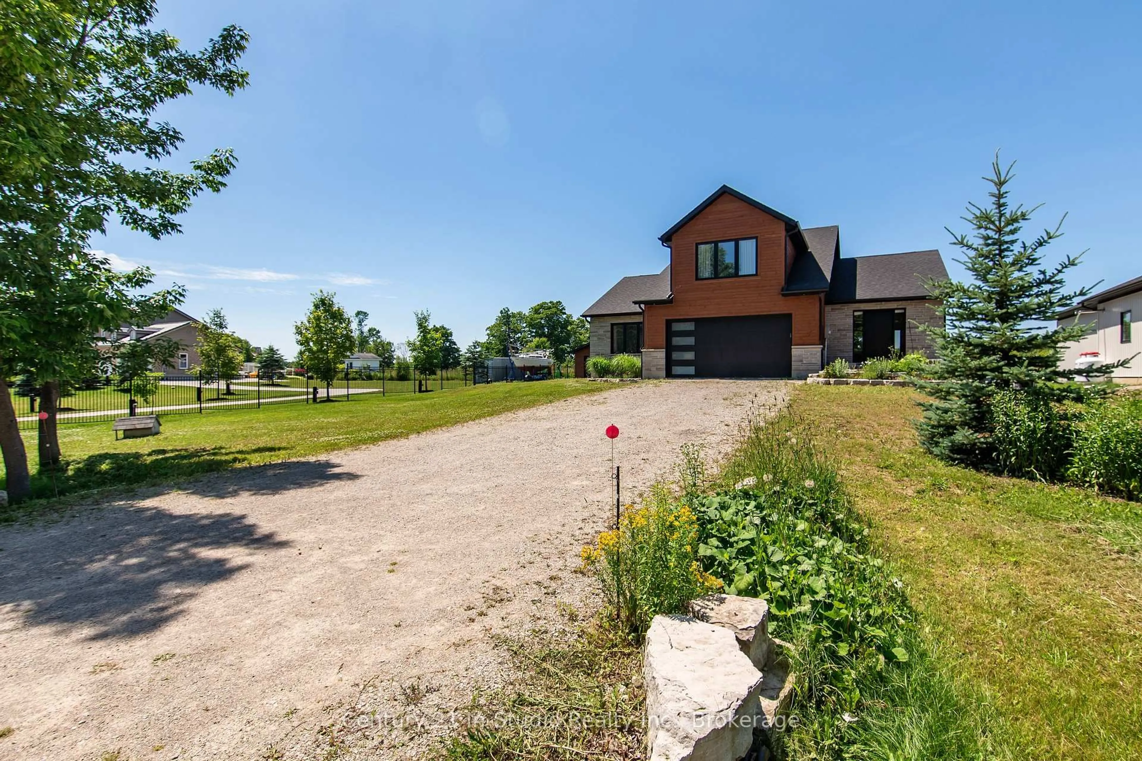 A pic from outside/outdoor area/front of a property/back of a property/a pic from drone, unknown for 67 Everett Rd, South Bruce Peninsula Ontario N0H 2T0