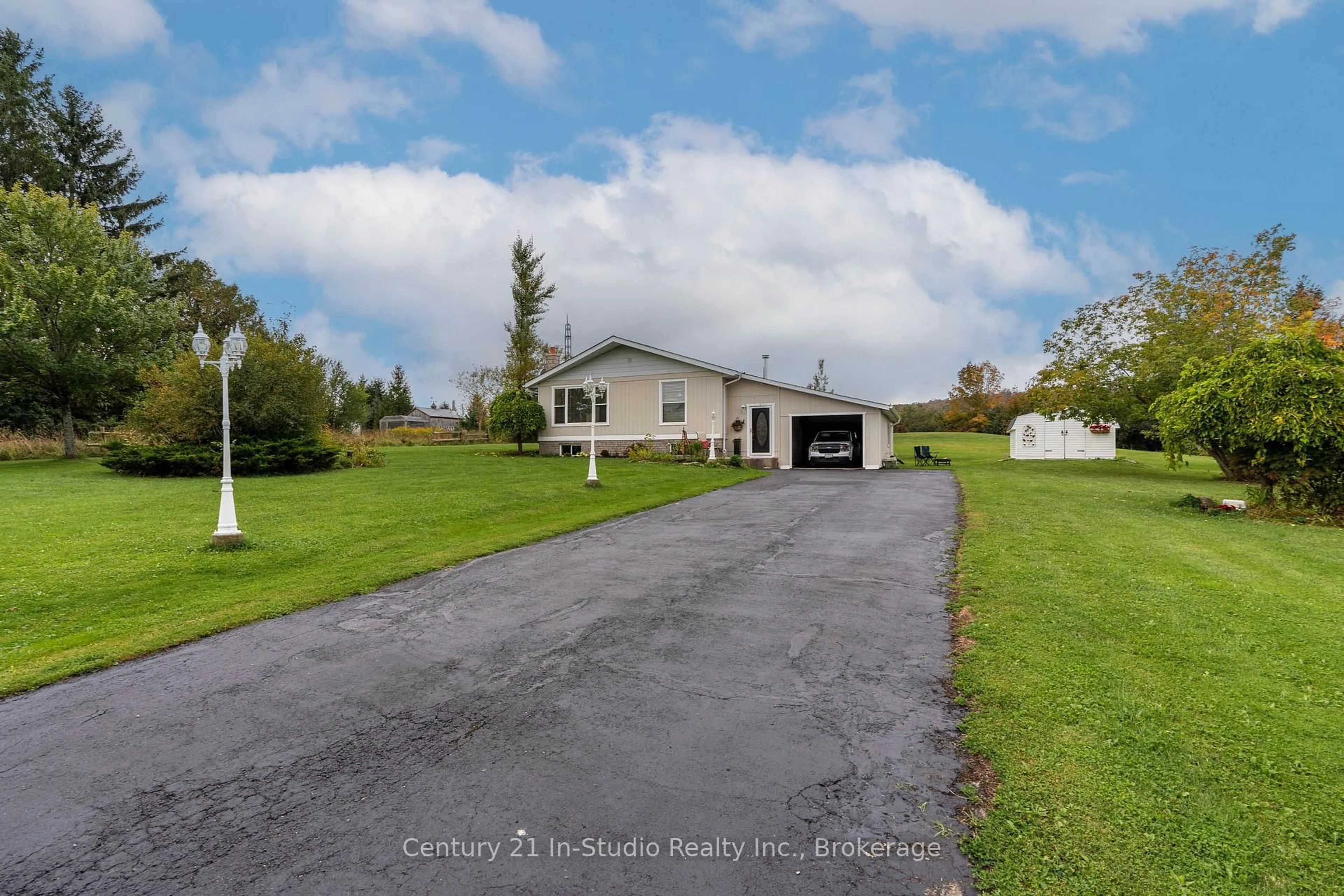 A pic from outside/outdoor area/front of a property/back of a property/a pic from drone, street for 618134 Grey 18 Rd, Owen Sound Ontario N4K 5W4