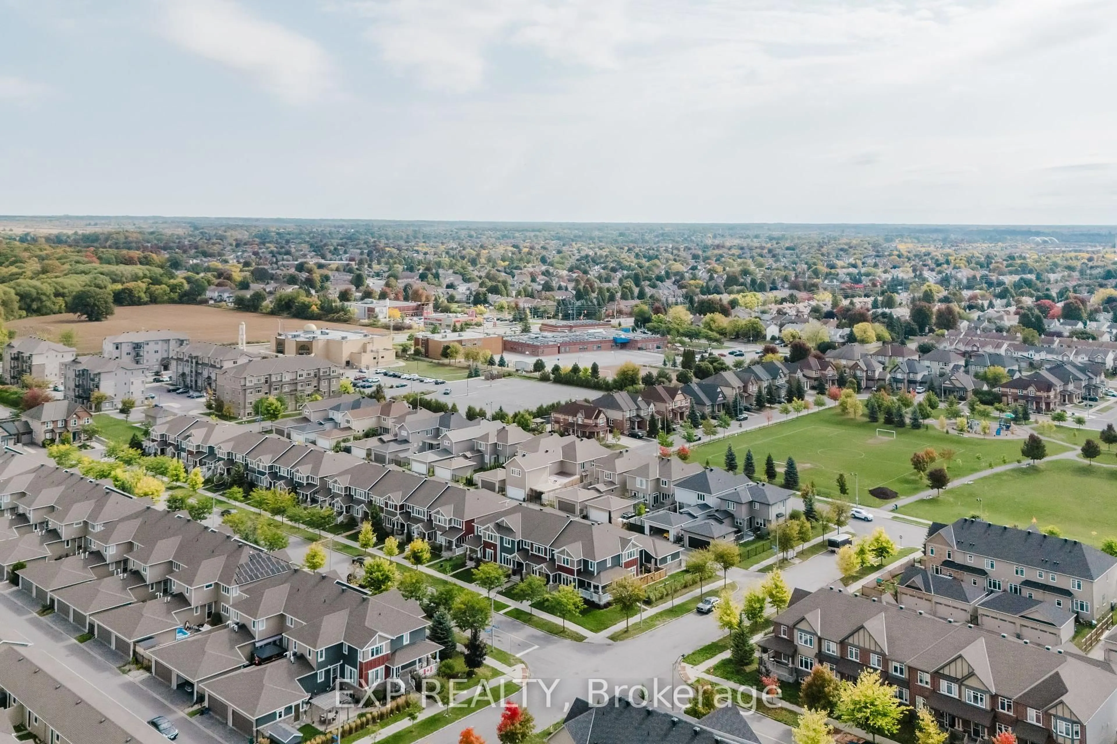 A pic from outside/outdoor area/front of a property/back of a property/a pic from drone, street for 400 Sweetflag St, Ottawa Ontario K2J 5Y6