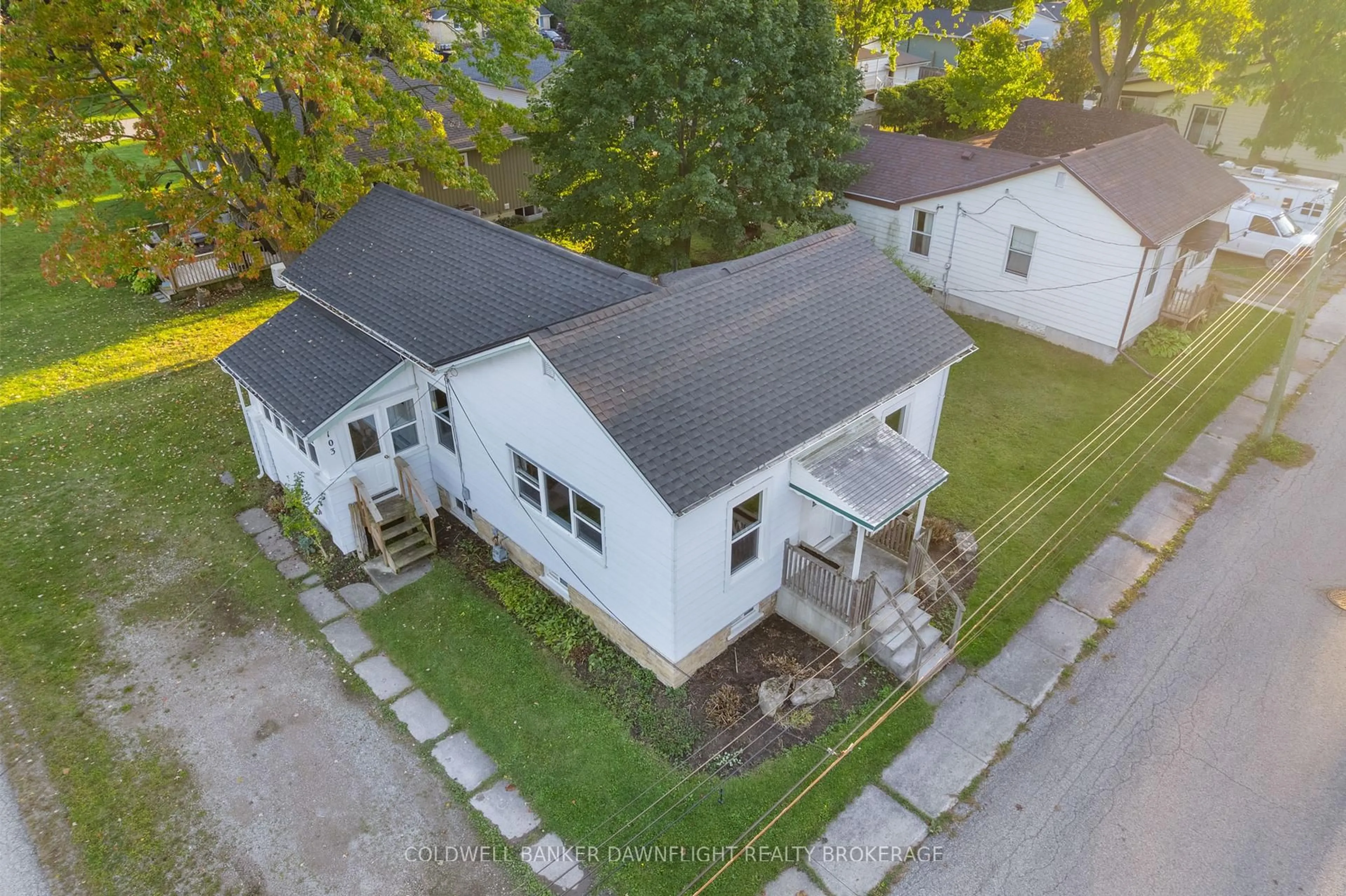 A pic from outside/outdoor area/front of a property/back of a property/a pic from drone, street for 103 Park St, South Huron Ontario N0M 1S2