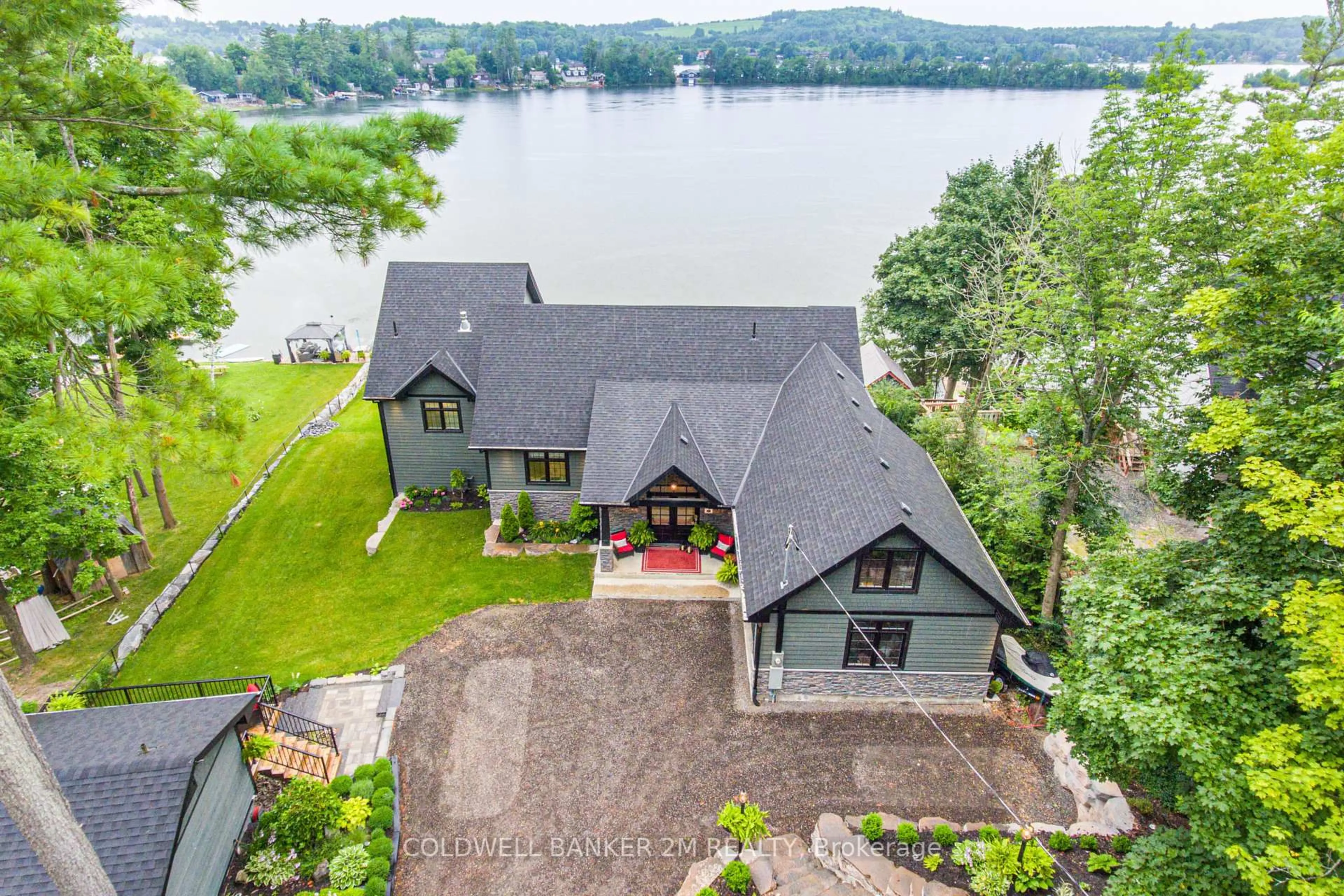 A pic from outside/outdoor area/front of a property/back of a property/a pic from drone, water/lake/river/ocean view for 330 Fife Ave, Selwyn Ontario K9J 0C6