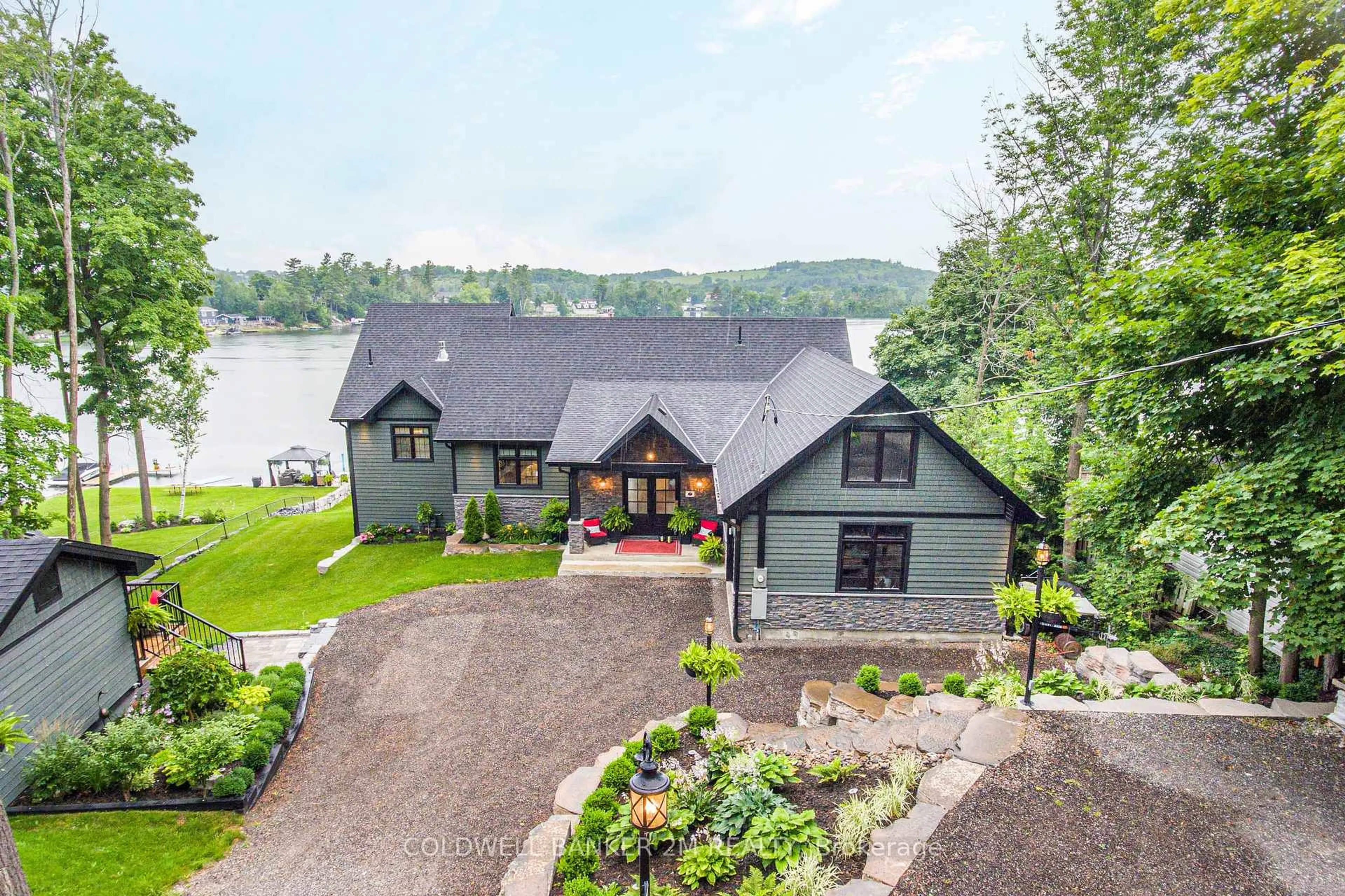 A pic from outside/outdoor area/front of a property/back of a property/a pic from drone, water/lake/river/ocean view for 330 Fife Ave, Selwyn Ontario K9J 0C6