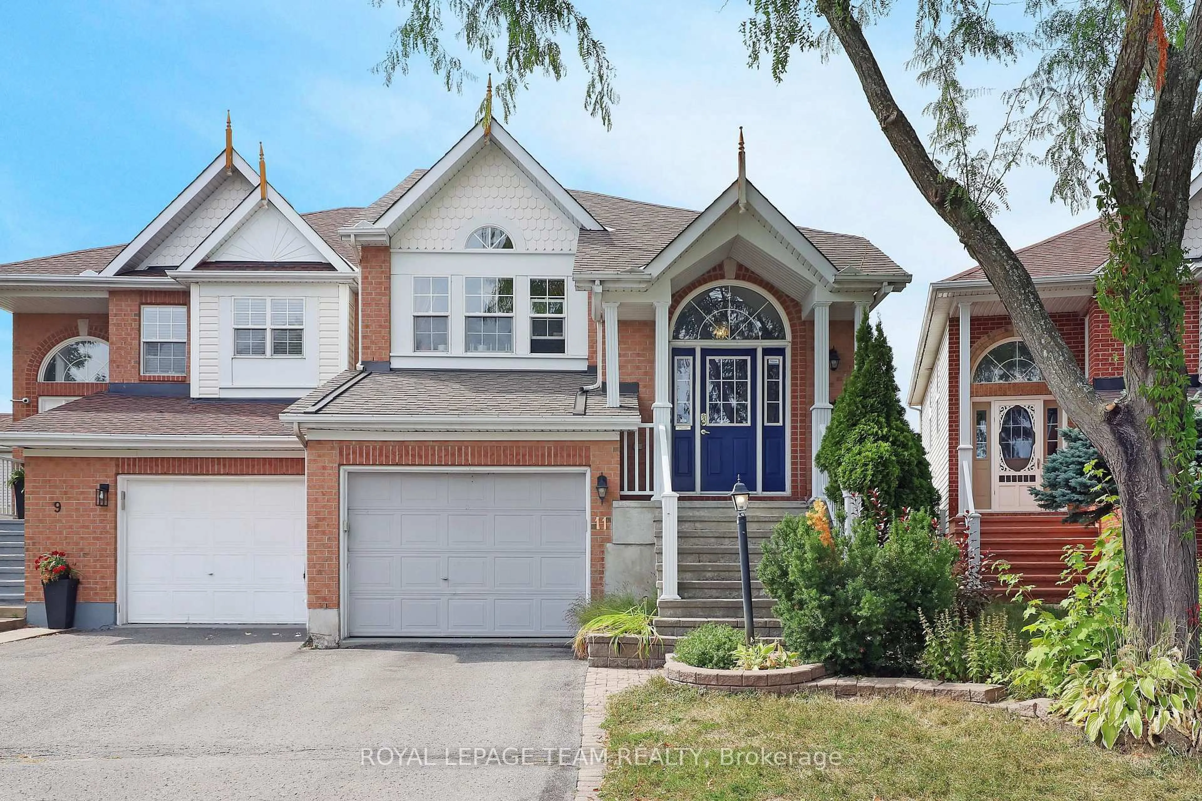 Home with vinyl exterior material, street for 11 Saffron Crt, Ottawa Ontario K2J 4R7