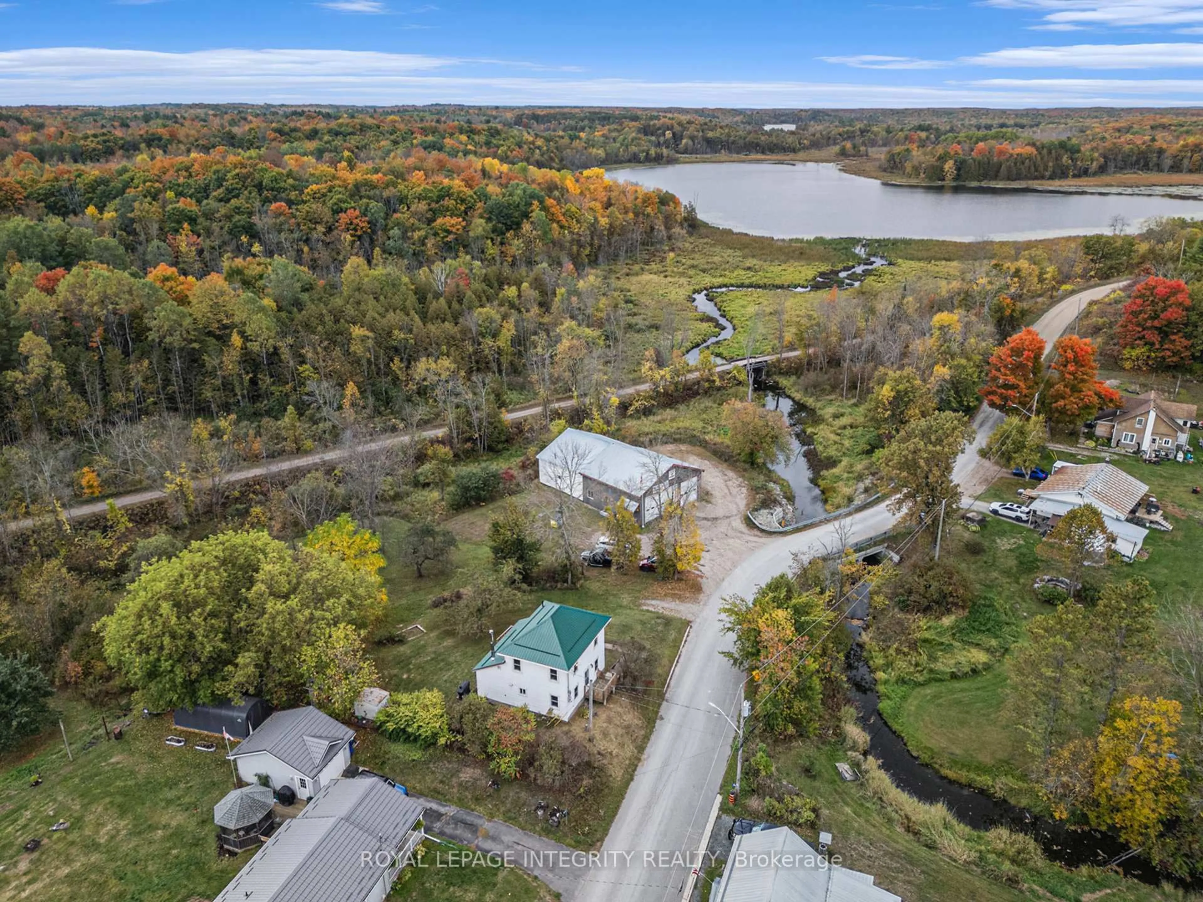 A pic from outside/outdoor area/front of a property/back of a property/a pic from drone, water/lake/river/ocean view for 1081 Elm Tree Rd, Arden Ontario K0H 1B0