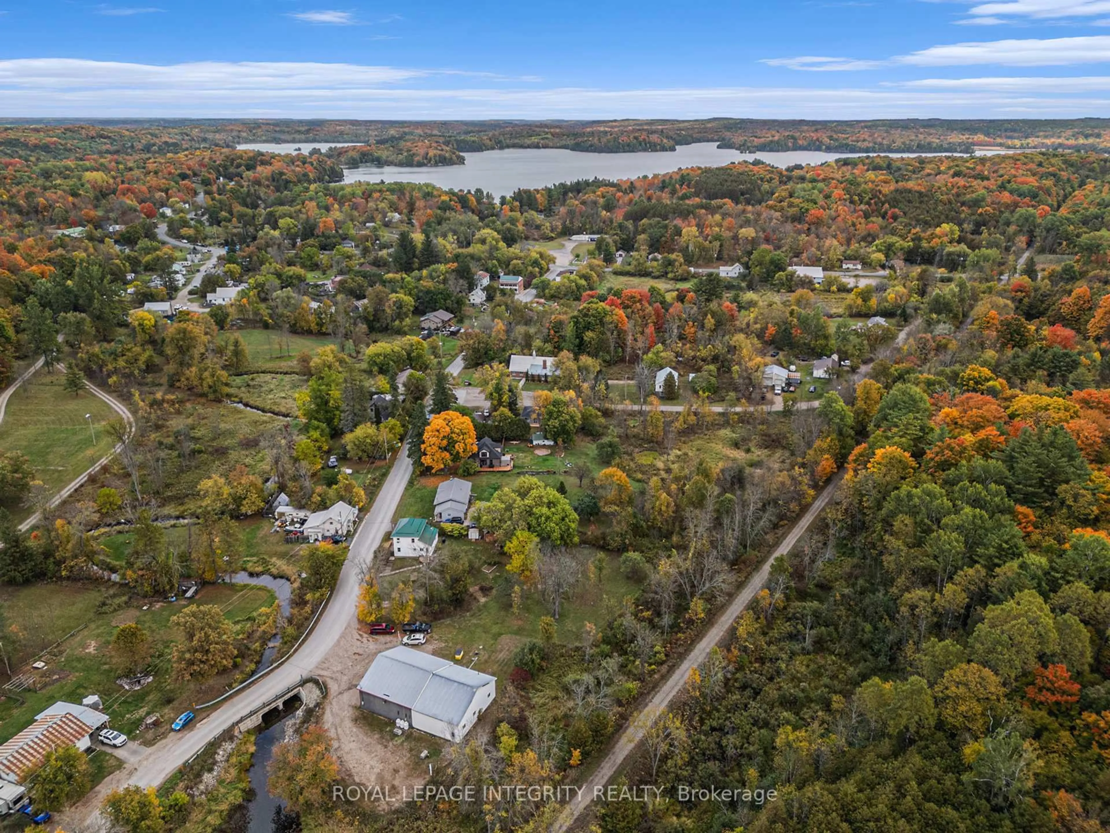 A pic from outside/outdoor area/front of a property/back of a property/a pic from drone, water/lake/river/ocean view for 1081 Elm Tree Rd, Arden Ontario K0H 1B0