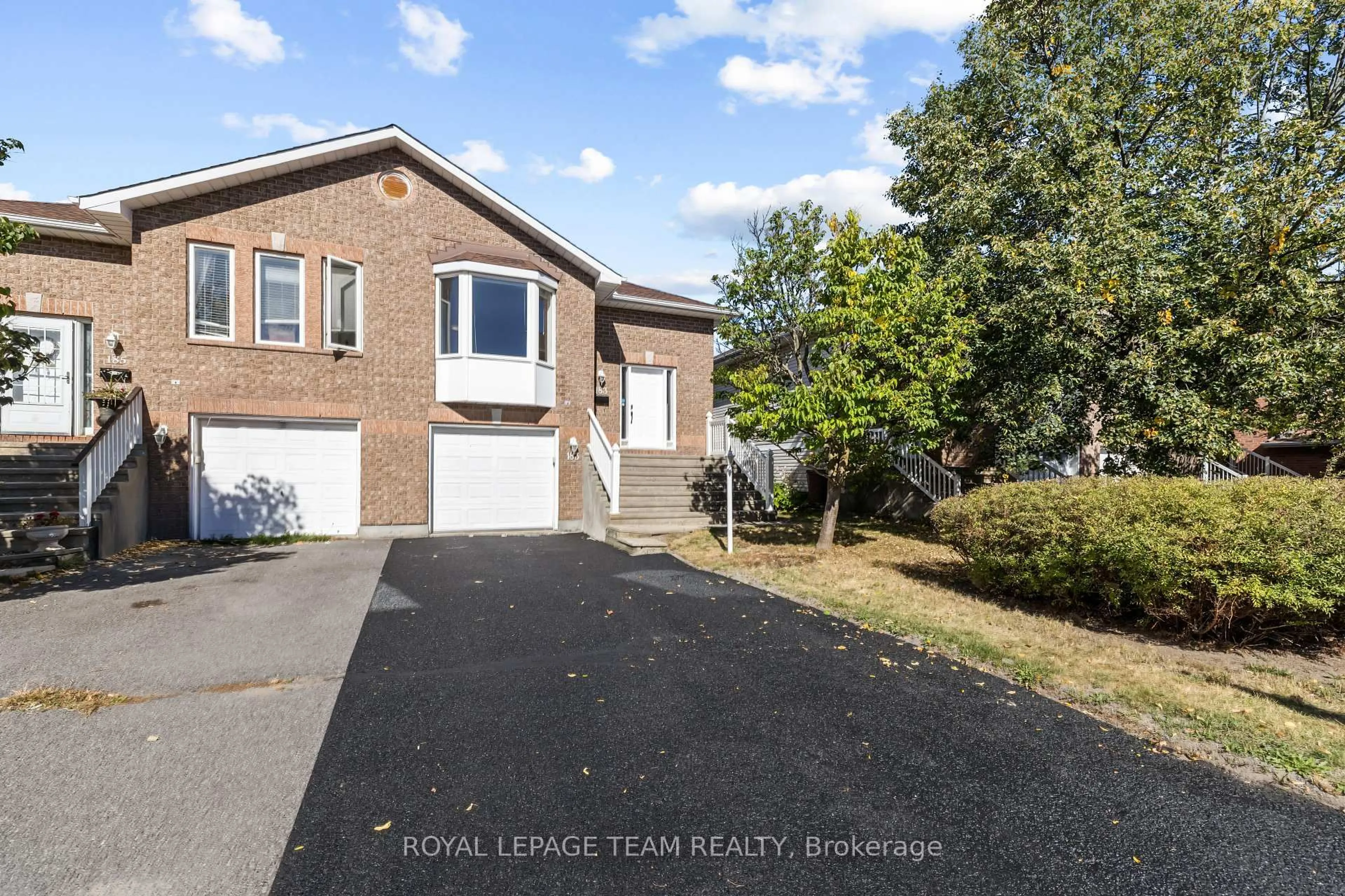 A pic from outside/outdoor area/front of a property/back of a property/a pic from drone, street for 183 Mountshannon Dr, Ottawa Ontario K2J 4R9