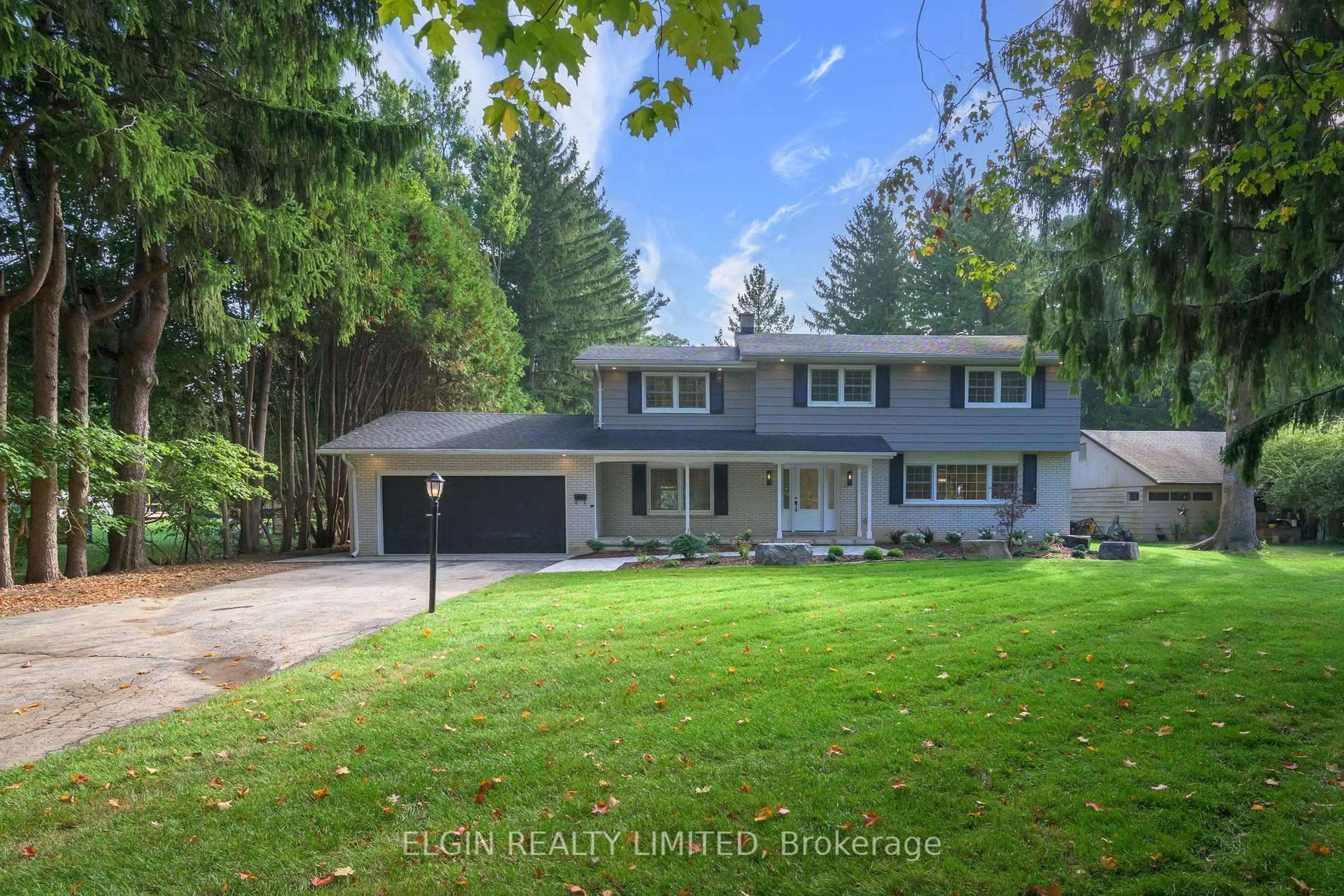 Home with vinyl exterior material, street for 67 Crescent Ave, Central Elgin Ontario N5P 2K3