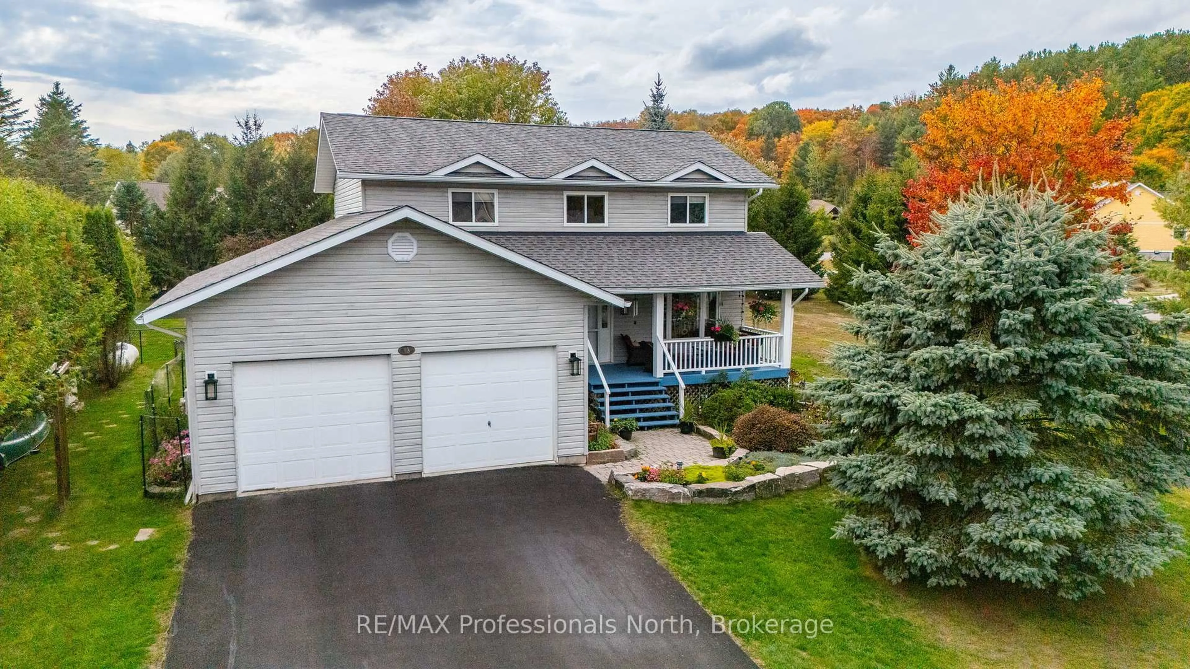 A pic from outside/outdoor area/front of a property/back of a property/a pic from drone, street for 13 Glebe Rd, Dysart et al Ontario K0M 1S0