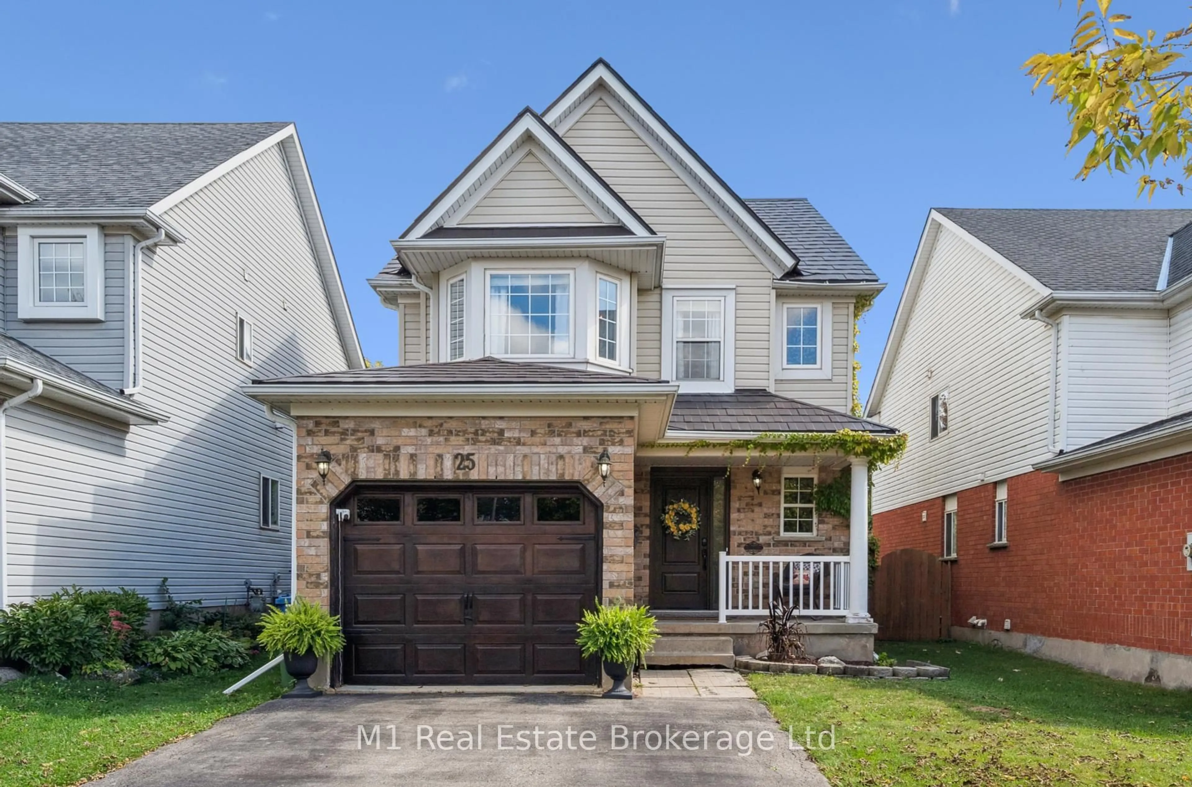 Home with brick exterior material, street for 25 Mackay St, Guelph Ontario N1E 7H3