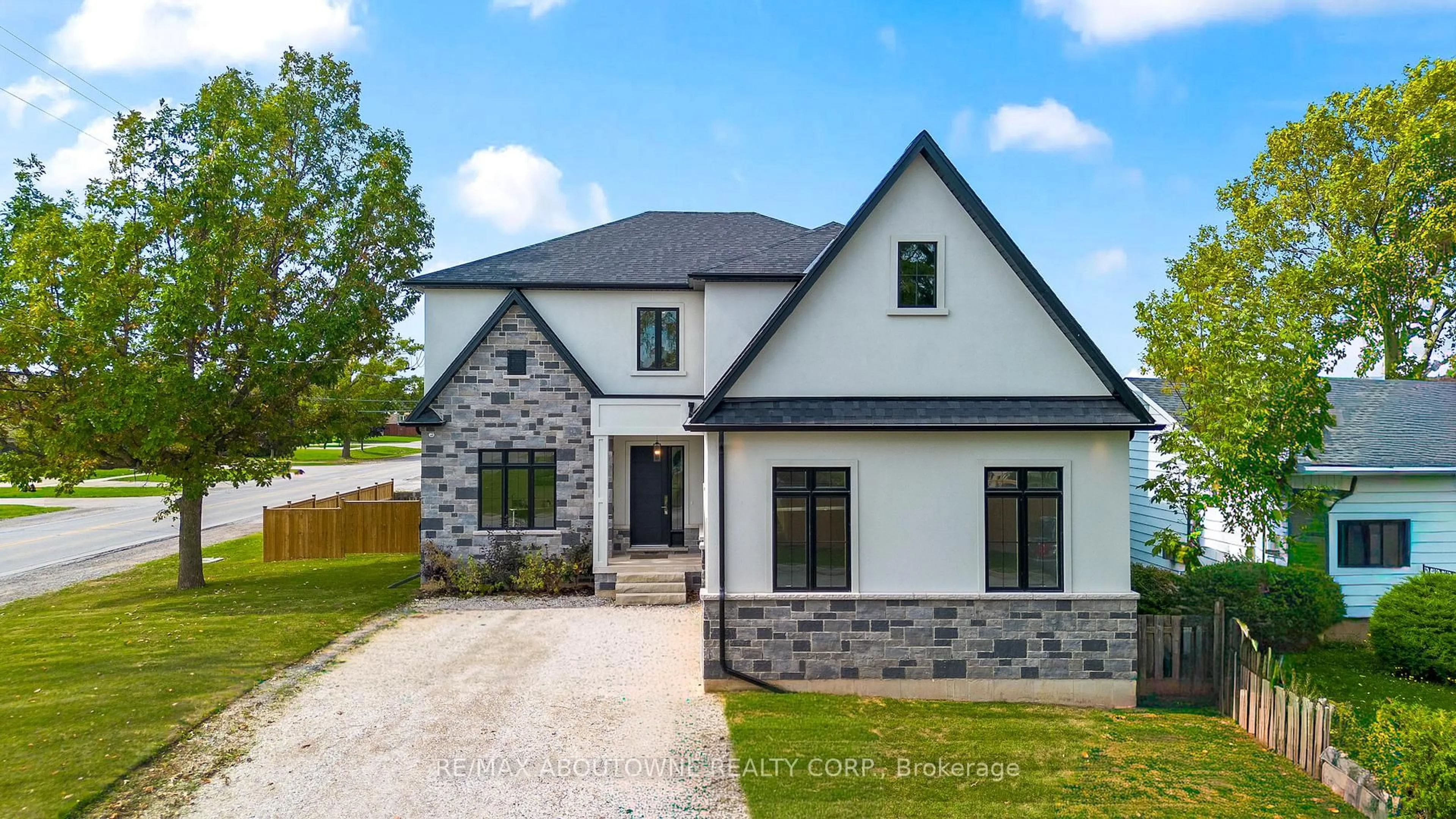 Home with brick exterior material, street for 1 West Ave, Hamilton Ontario L8E 5L5