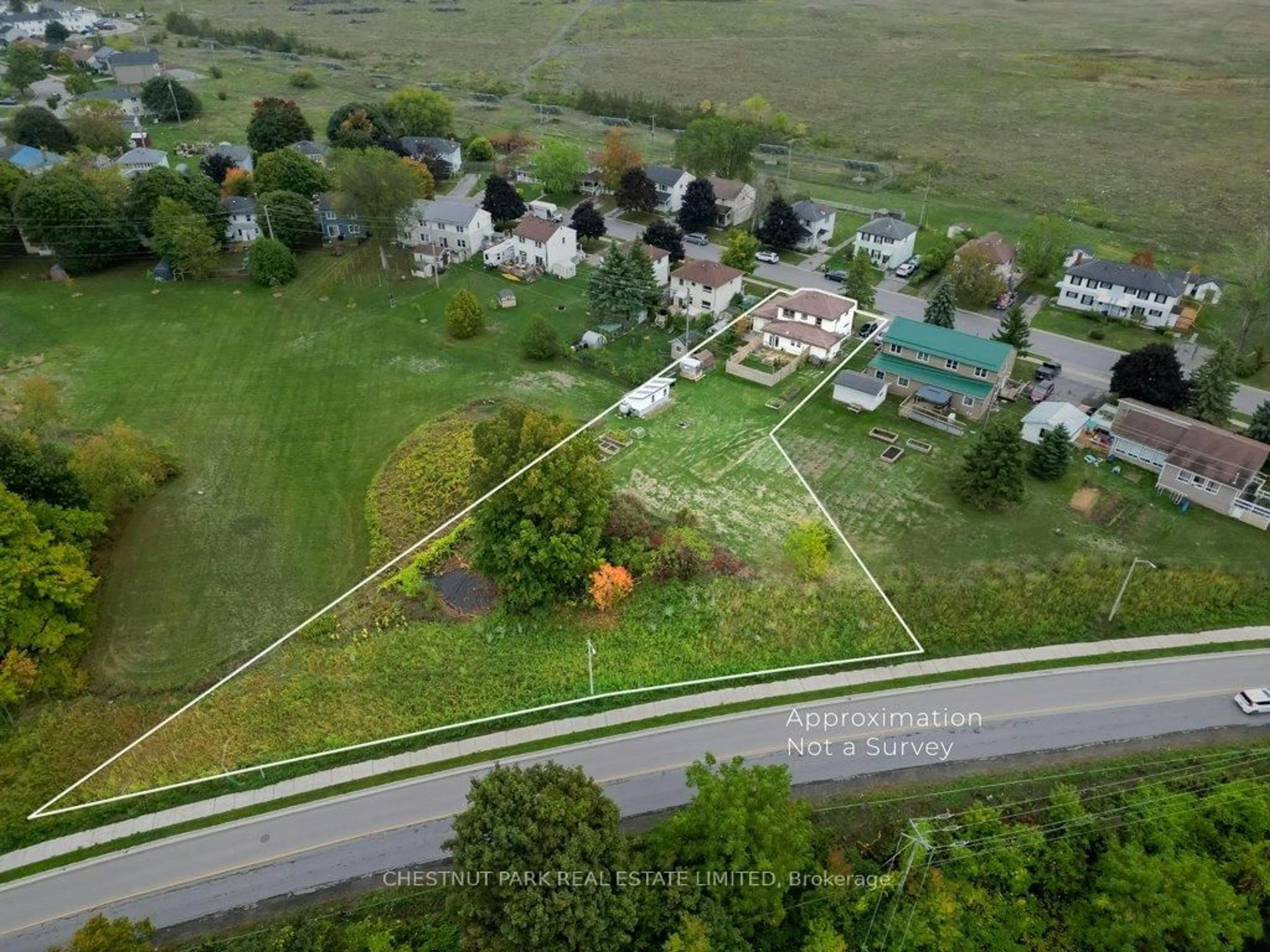 A pic from outside/outdoor area/front of a property/back of a property/a pic from drone, street for 6 London Ave, Prince Edward County Ontario K0K 2T0