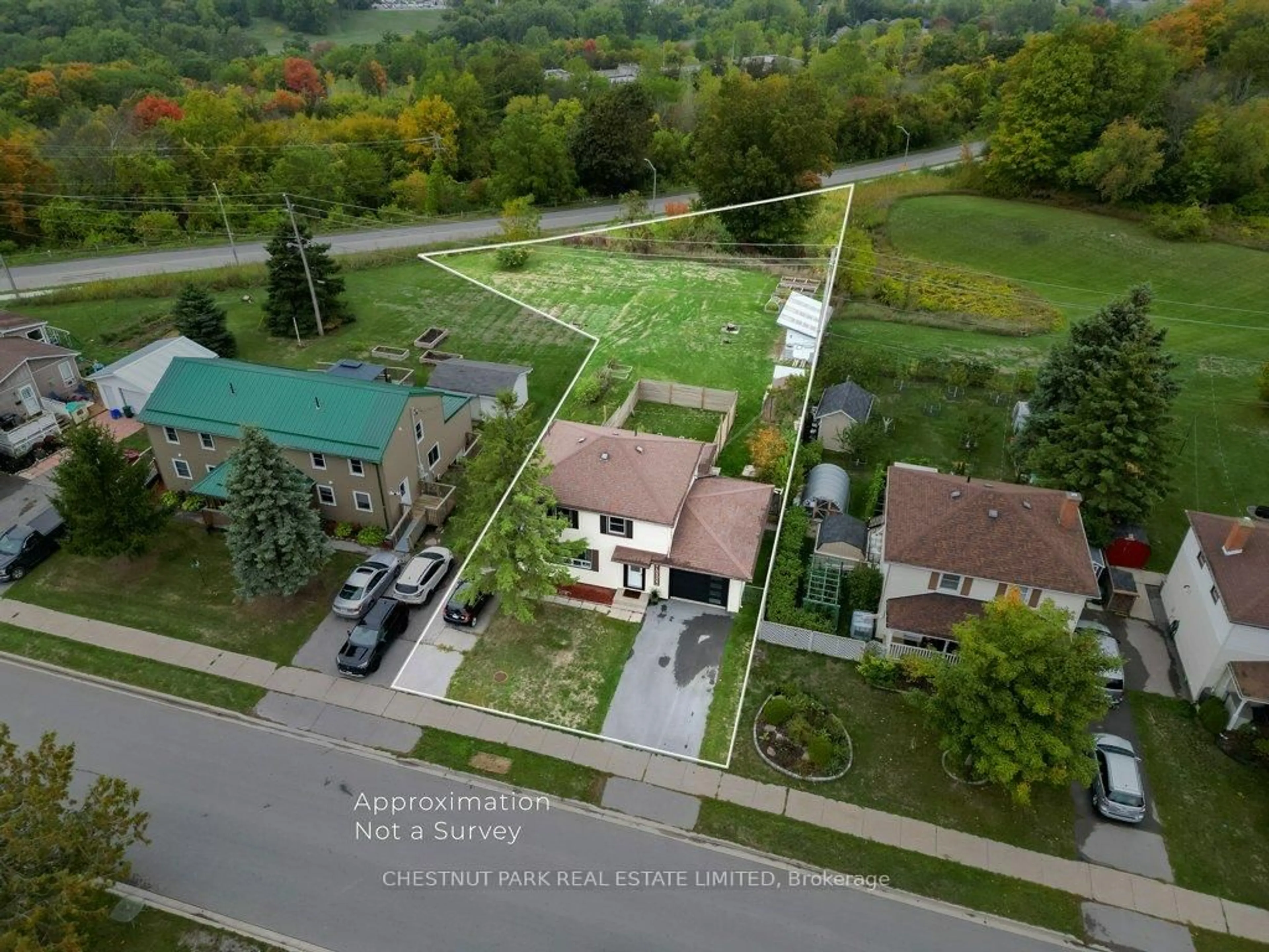 A pic from outside/outdoor area/front of a property/back of a property/a pic from drone, street for 6 London Ave, Prince Edward County Ontario K0K 2T0