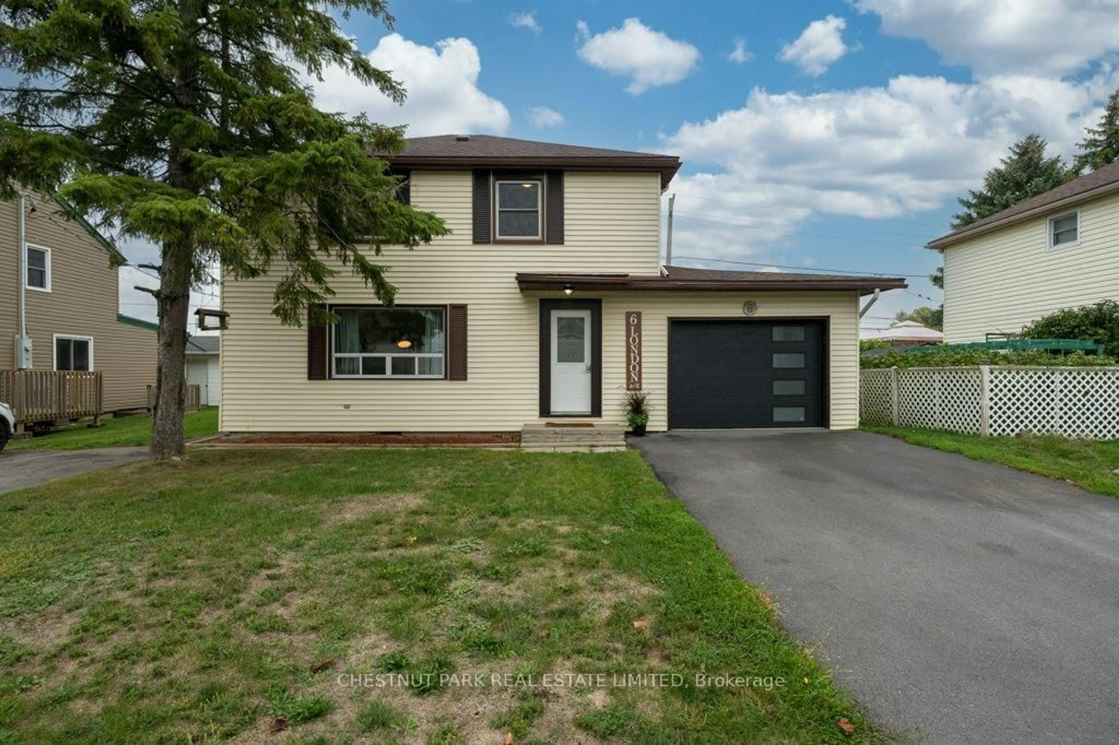 Home with vinyl exterior material, street for 6 London Ave, Prince Edward County Ontario K0K 2T0
